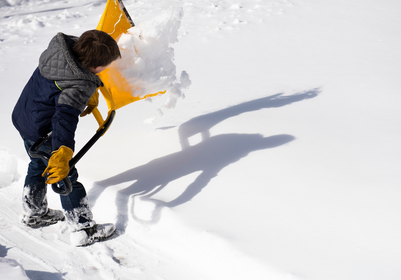 Kid starts a snow shoveling business to earn money and help people