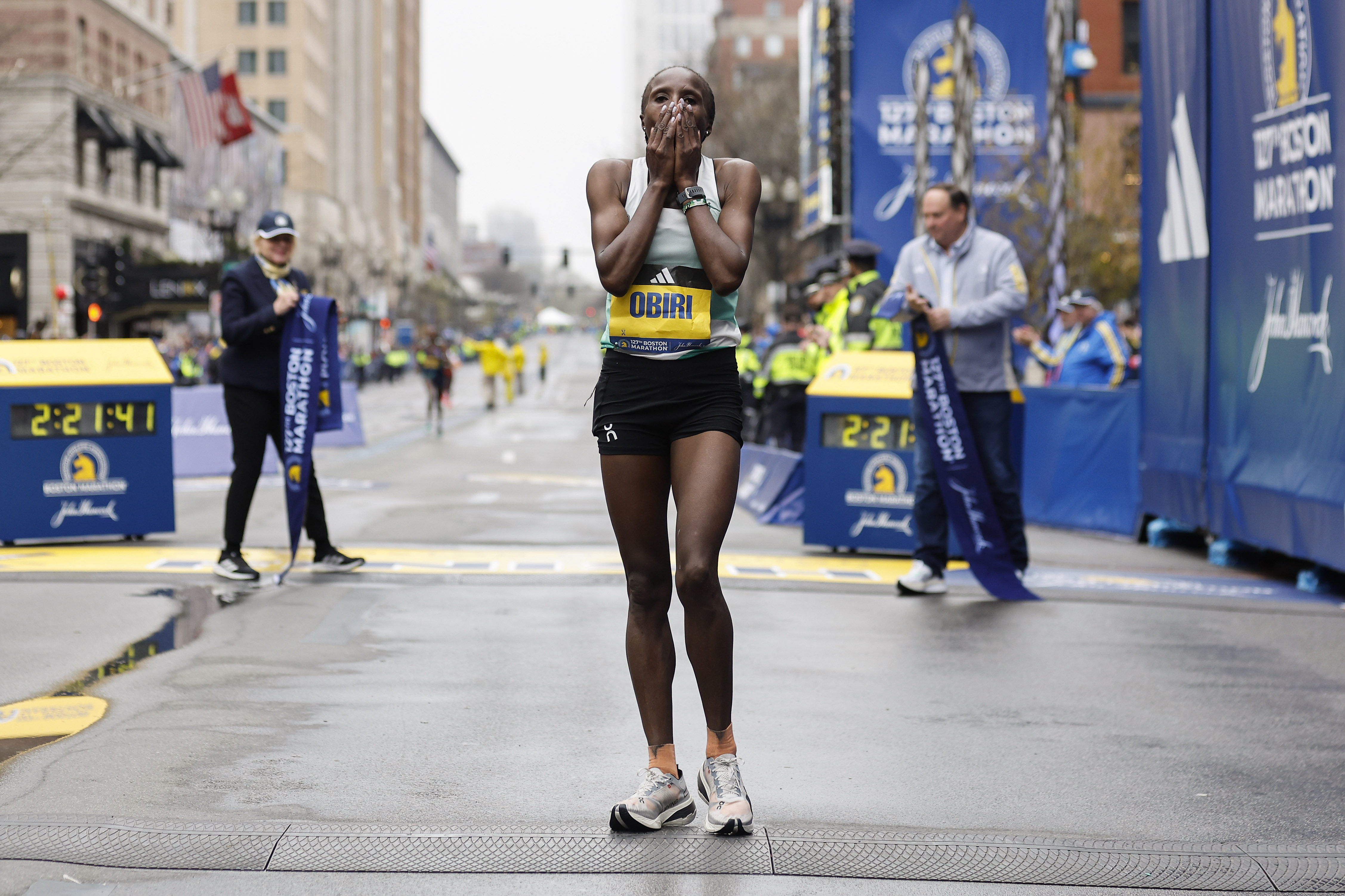 Cheruiyot stands tall to defend Boston Marathon title
