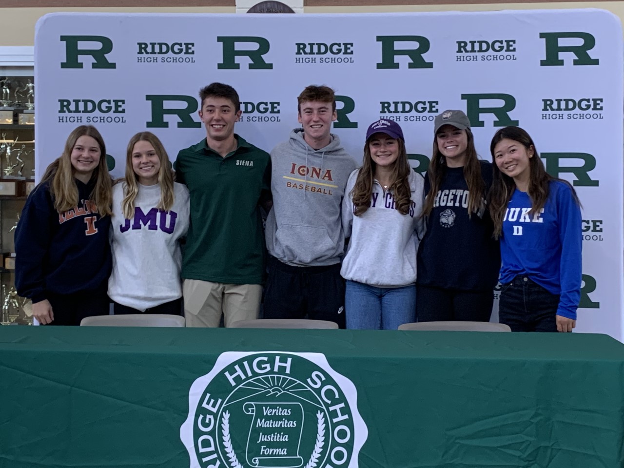 Ridge NLI Signees - Left to Right
Madison Vitolo - Illinois for gymnastics
Katie Vitolo - James Madison for diving
Connor Byrne - Siena for baseball
Brendan Callanan - Iona for baseball
Jennifer Prince - Holy Cross for women's lacrosse
Katie Keefe - Georgetown for women's soccer
Katie Li - Duke for women's golf