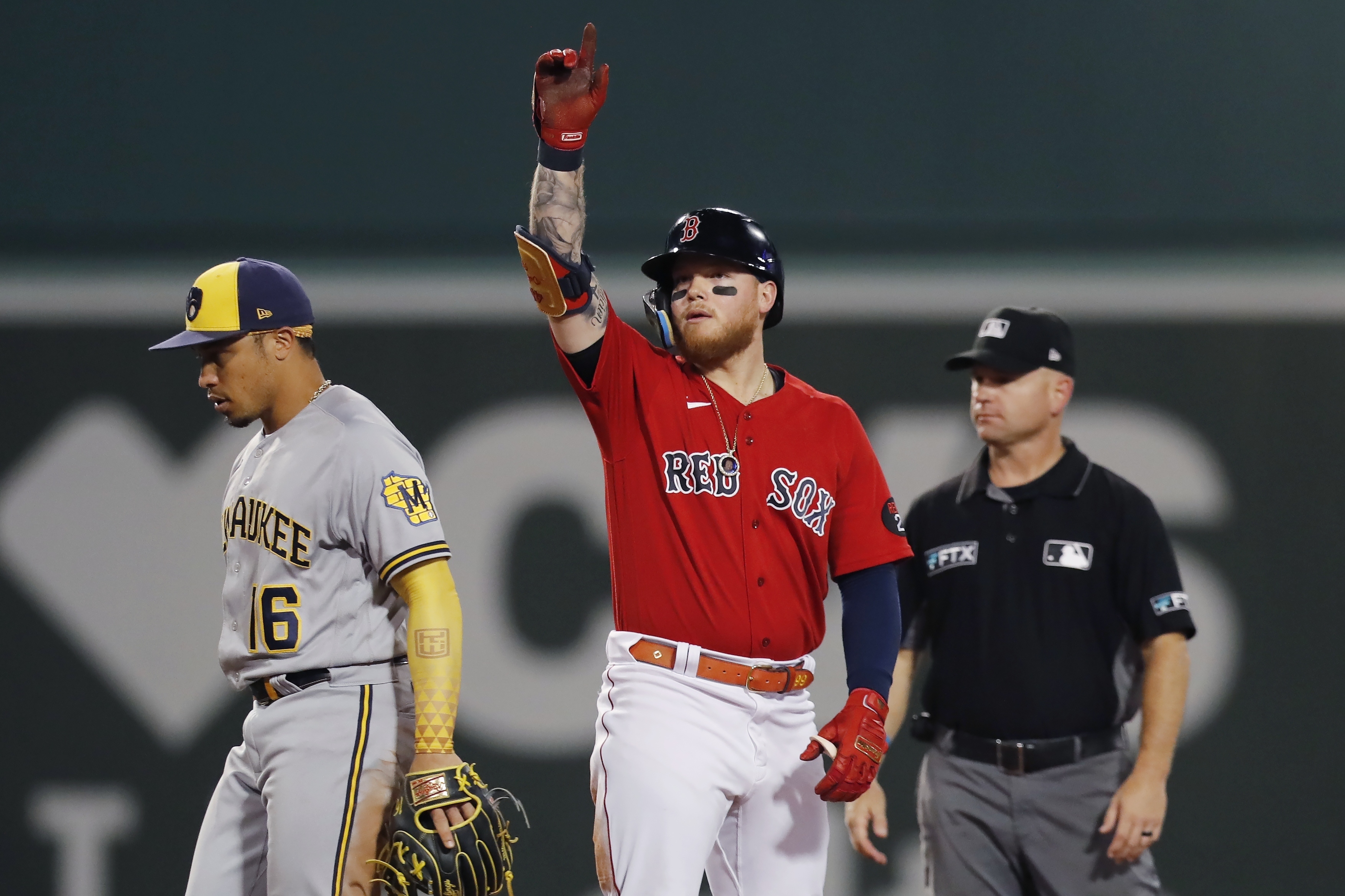 Alex Verdugo of the Boston Red Sox reacts with Jarren Duran after