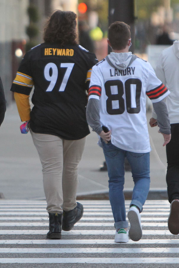 NFL jerseys and team costumes seen in downtown Cleveland during