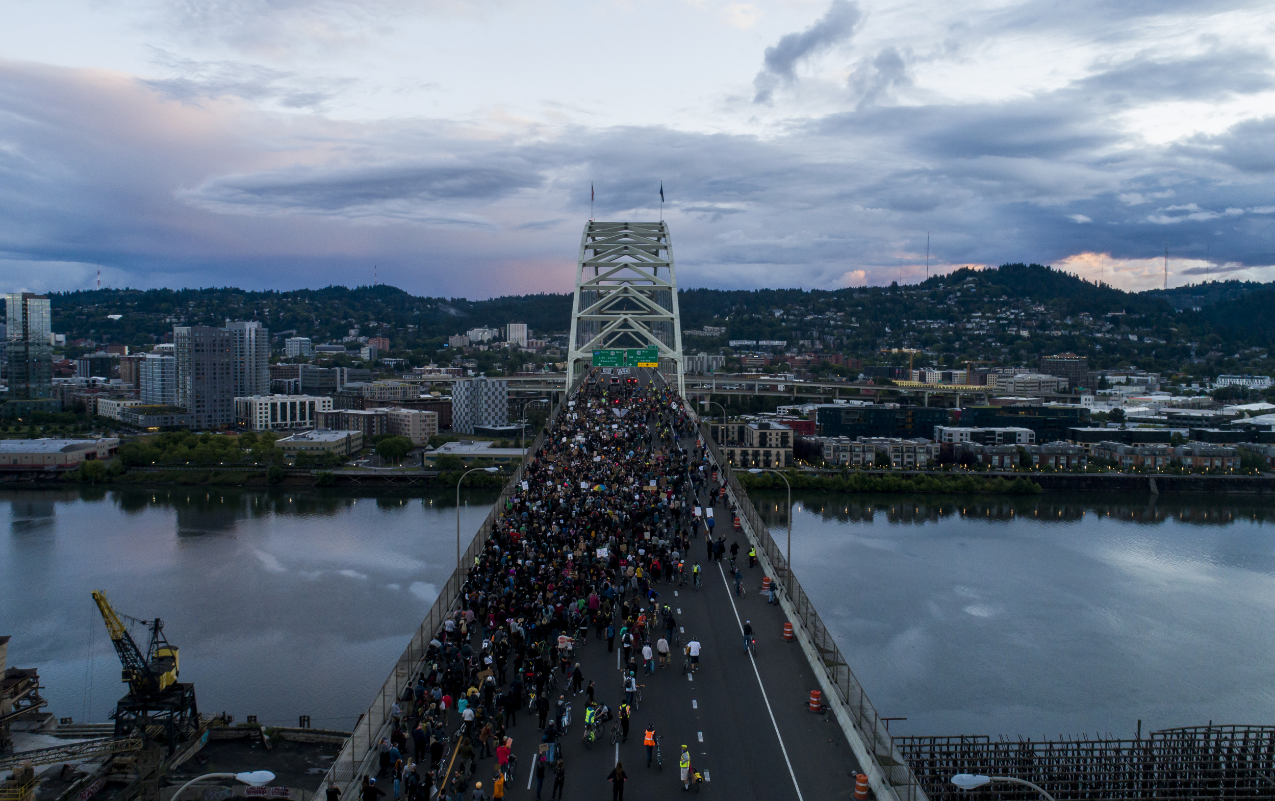Protesters march onto the Fremont Bridge on June 16, 2020 to rally against police brutality. Dave Killen / Staff
