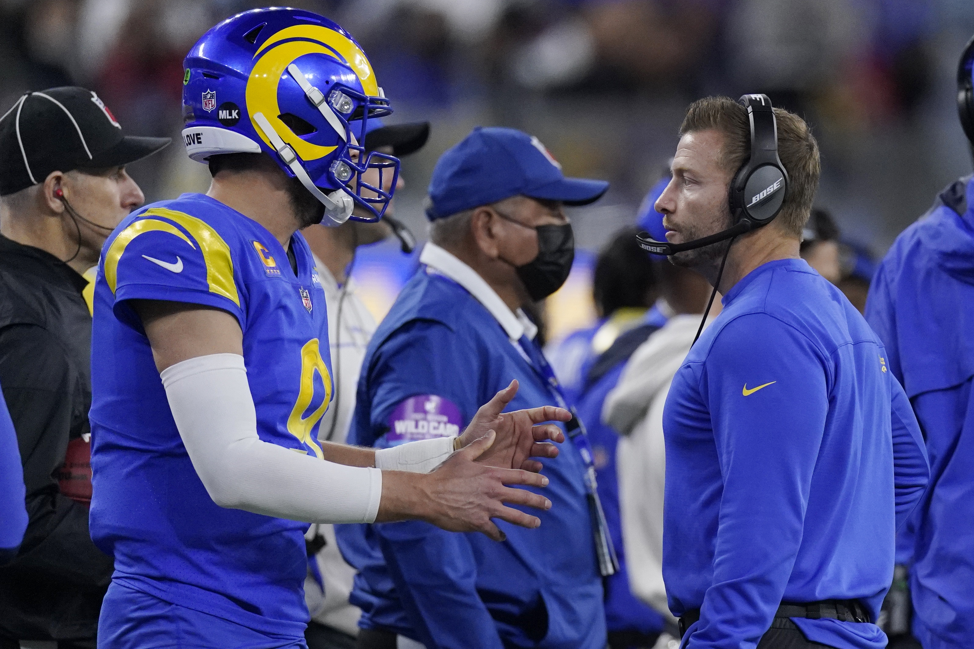 Stafford propels Rams past Cardinals 34-11 in playoff rout