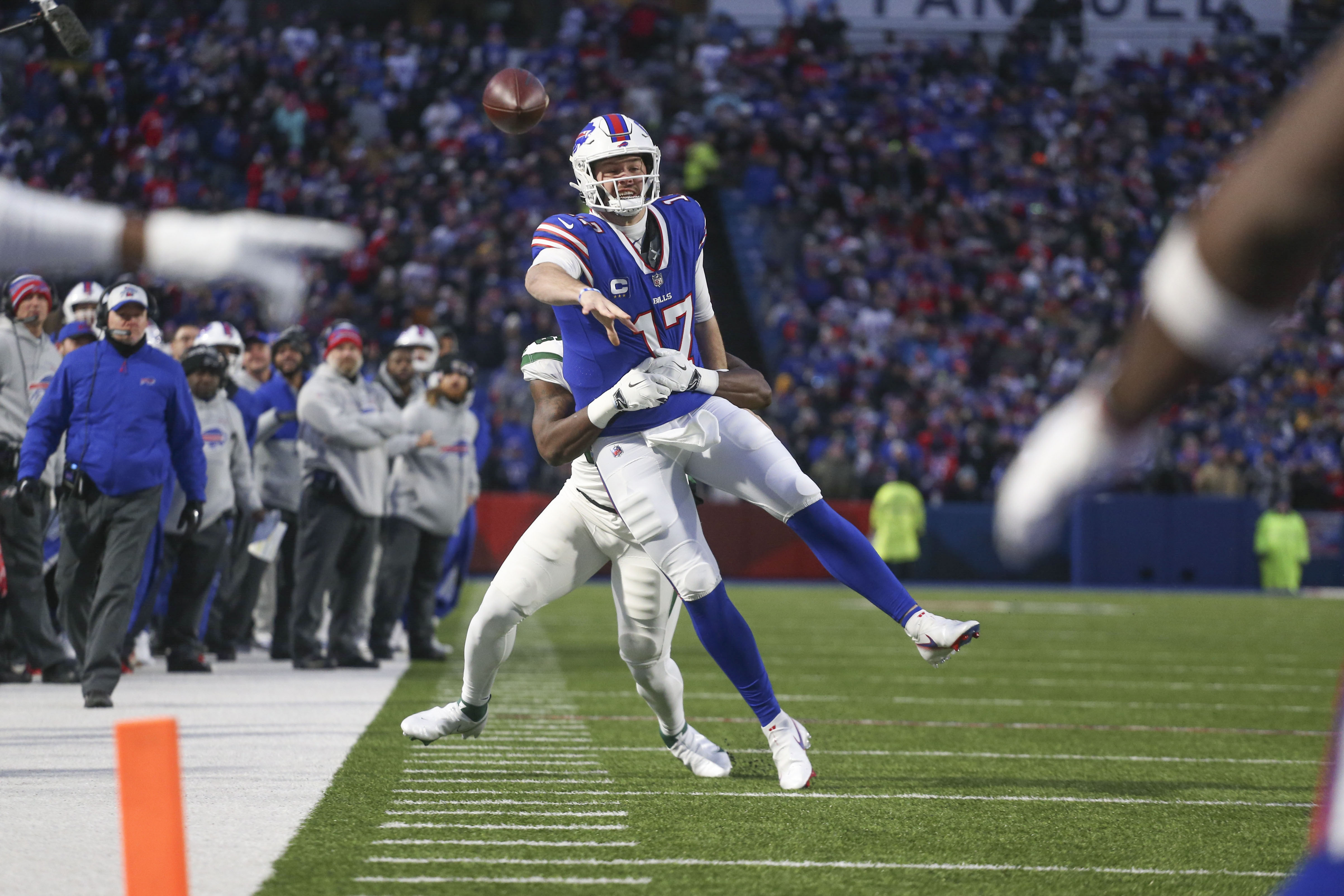 Buffalo Bills tackle Dion Dawkins (73) runs on the field during the second  half of an NFL football game against the New York Jets in Orchard Park,  N.Y., Sunday, Dec. 11, 2022. (