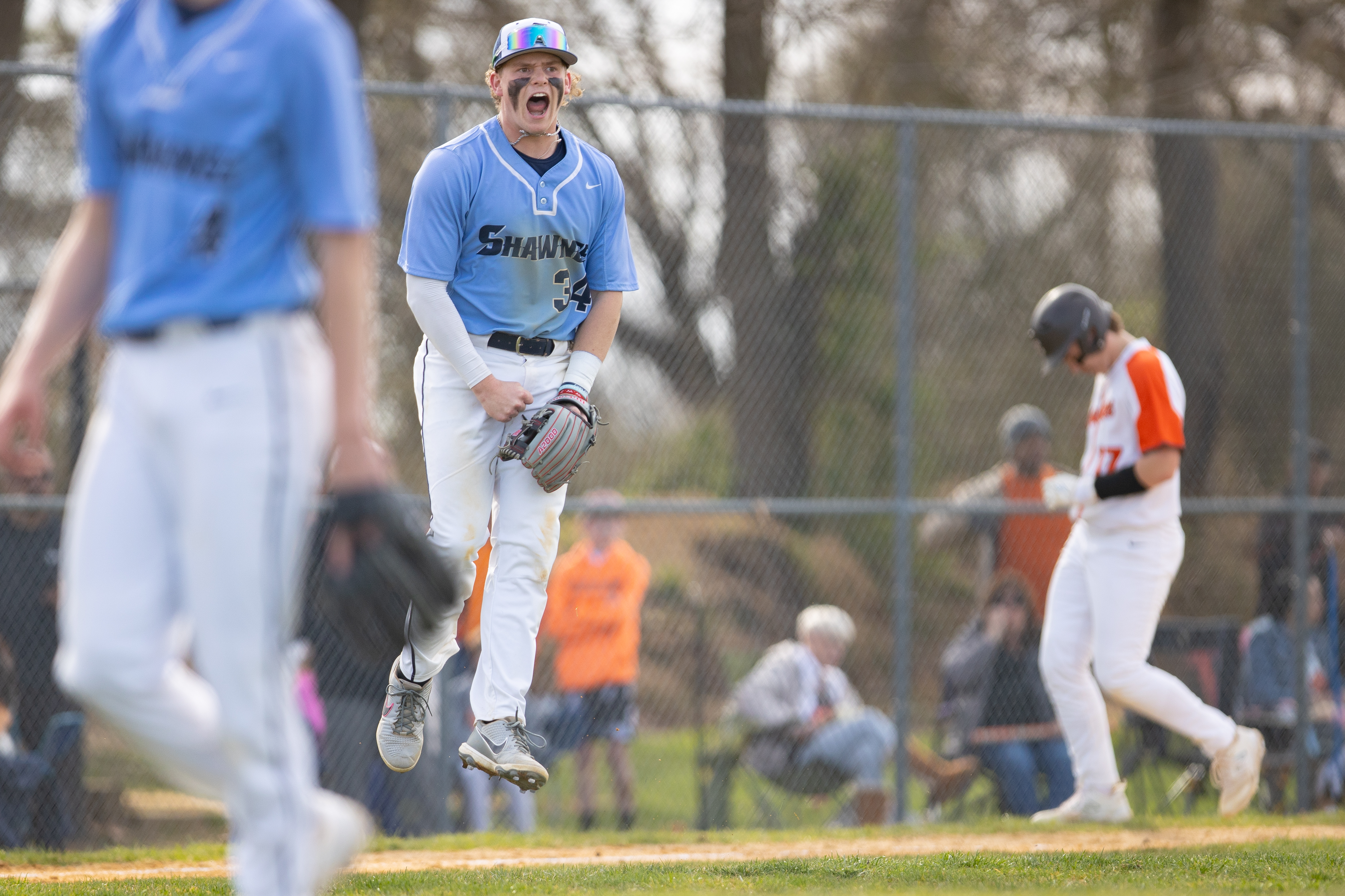 Michael Pierson (34) of Shawnee, celebrates an out at first in Marlton, NJ on Monday, April 3, 2023.