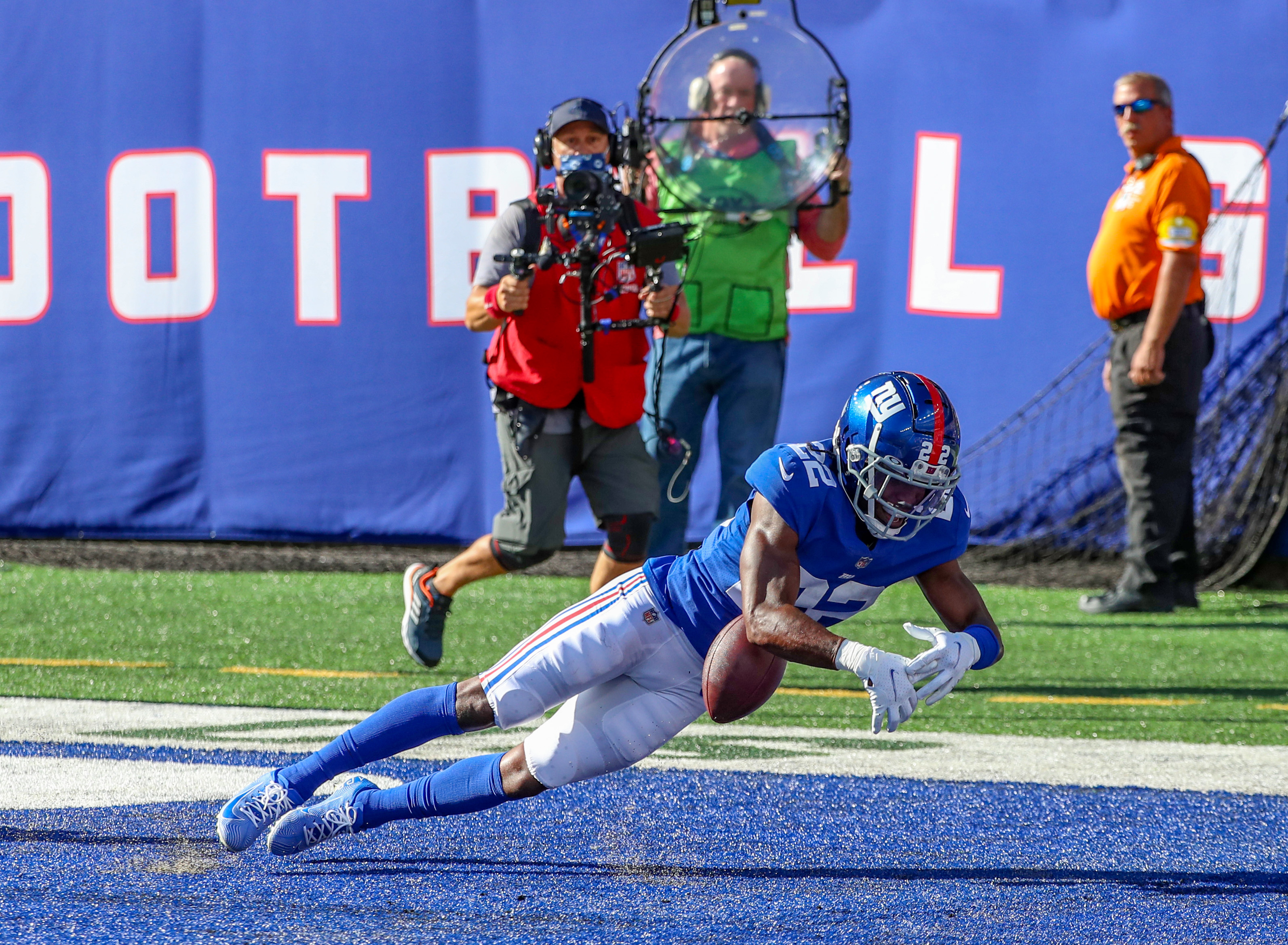 Atlanta Falcons running back Cordarrelle Patterson, below, is tackled by  New York Giants safety Xavier McKinney (29) during the first half of an NFL  football game, Sunday, Sept. 26, 2021, in East