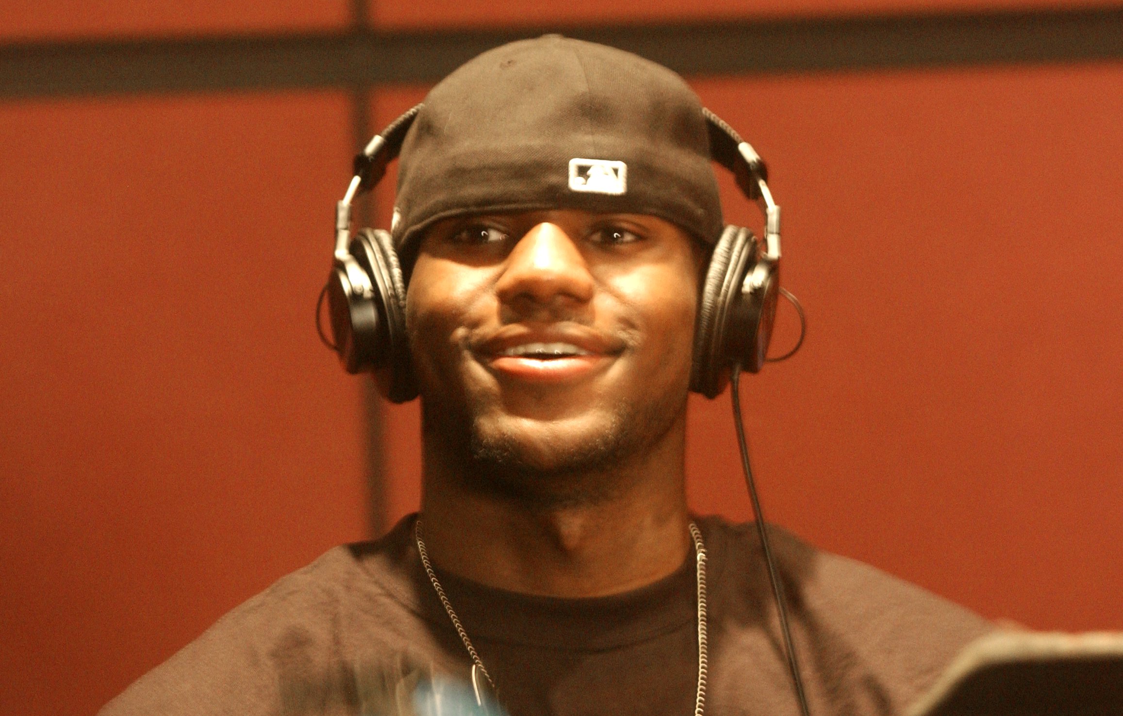 Cleveland Cavaliers 1st round draft pick, LeBron James, wears a set if headphones while taping a radio ad for the upcoming basketball season Thursday, Sept. 4, 2003, Independence, Ohio.  (Dale Omori/The Plain Dealer) 