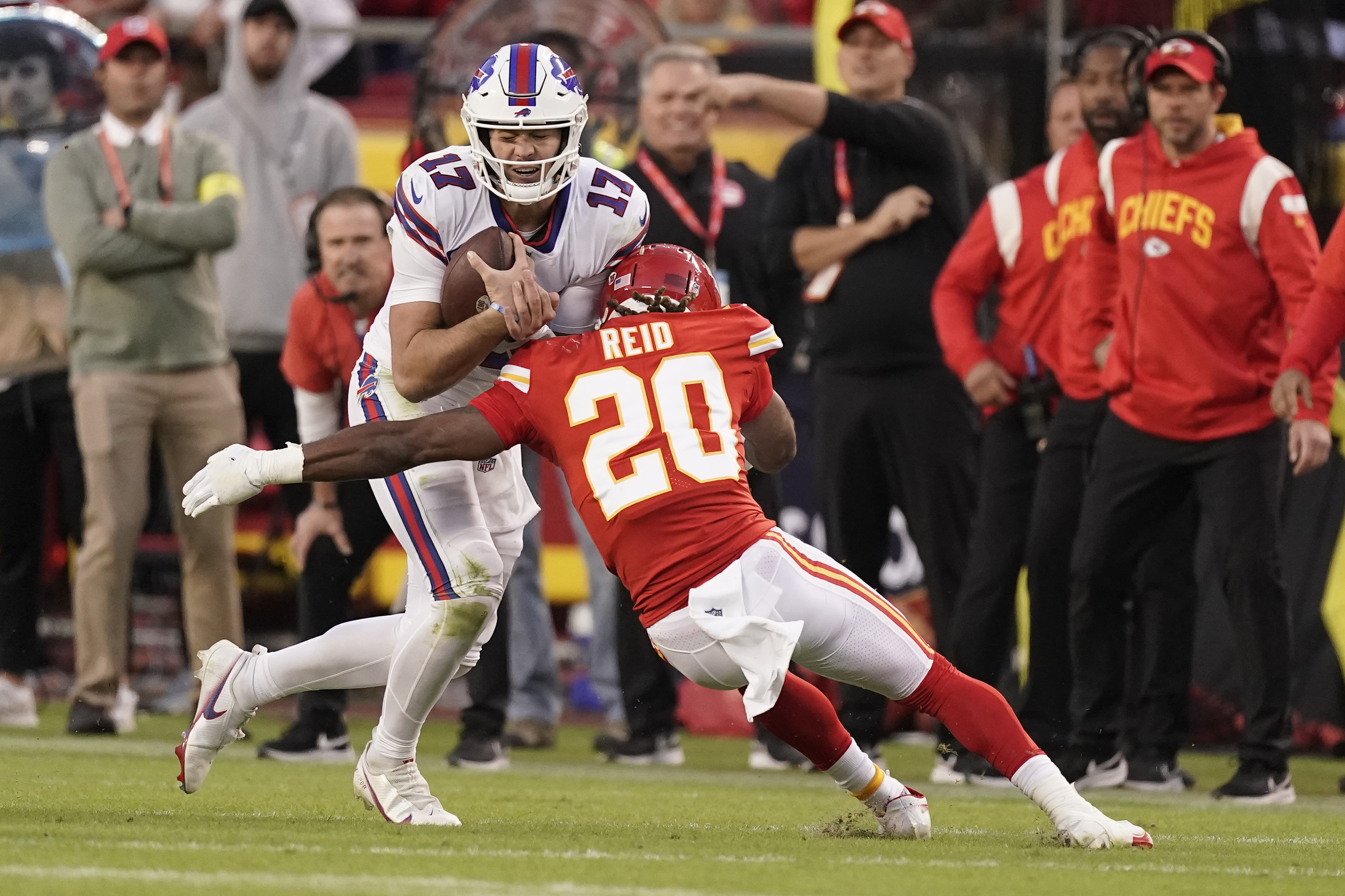 Kansas City Chiefs defensive end Frank Clark (55) celebrates after making a  tackled during the first half of an NFL divisional round playoff football  game against the Buffalo Bills, Sunday, Jan. 23