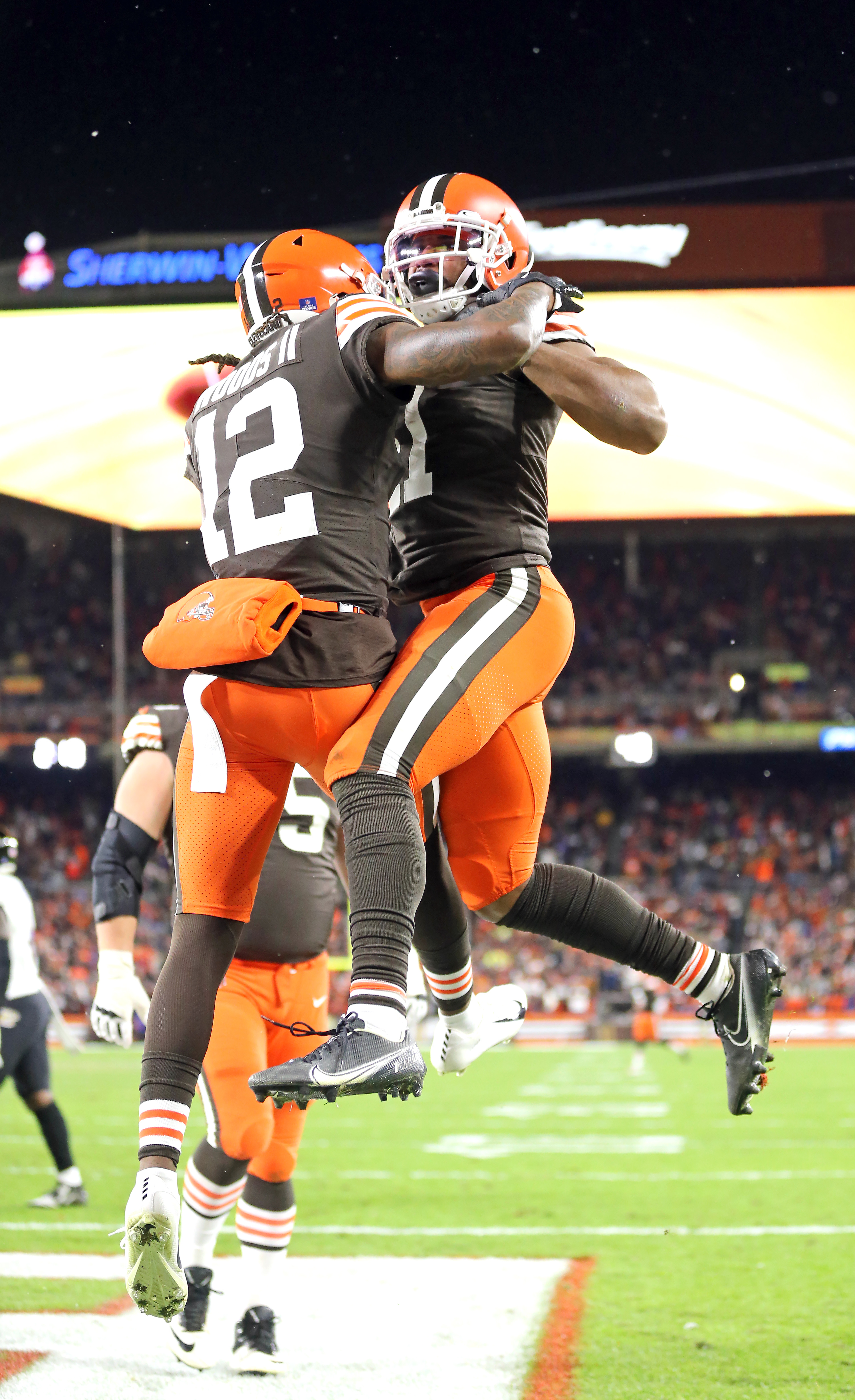 Baltimore Ravens safety Chuck Clark (36) grabs Cleveland Browns