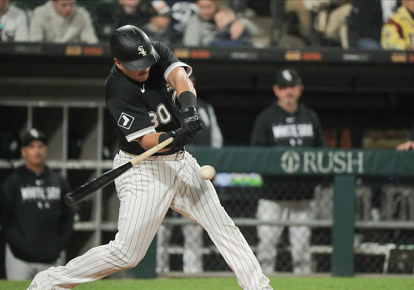 CLEVELAND, OH - MAY 22: Chicago White Sox center fielder Luis Robert Jr.  (88) singles during the first inning of the Major League Baseball game  between the Chicago White Sox and Cleveland