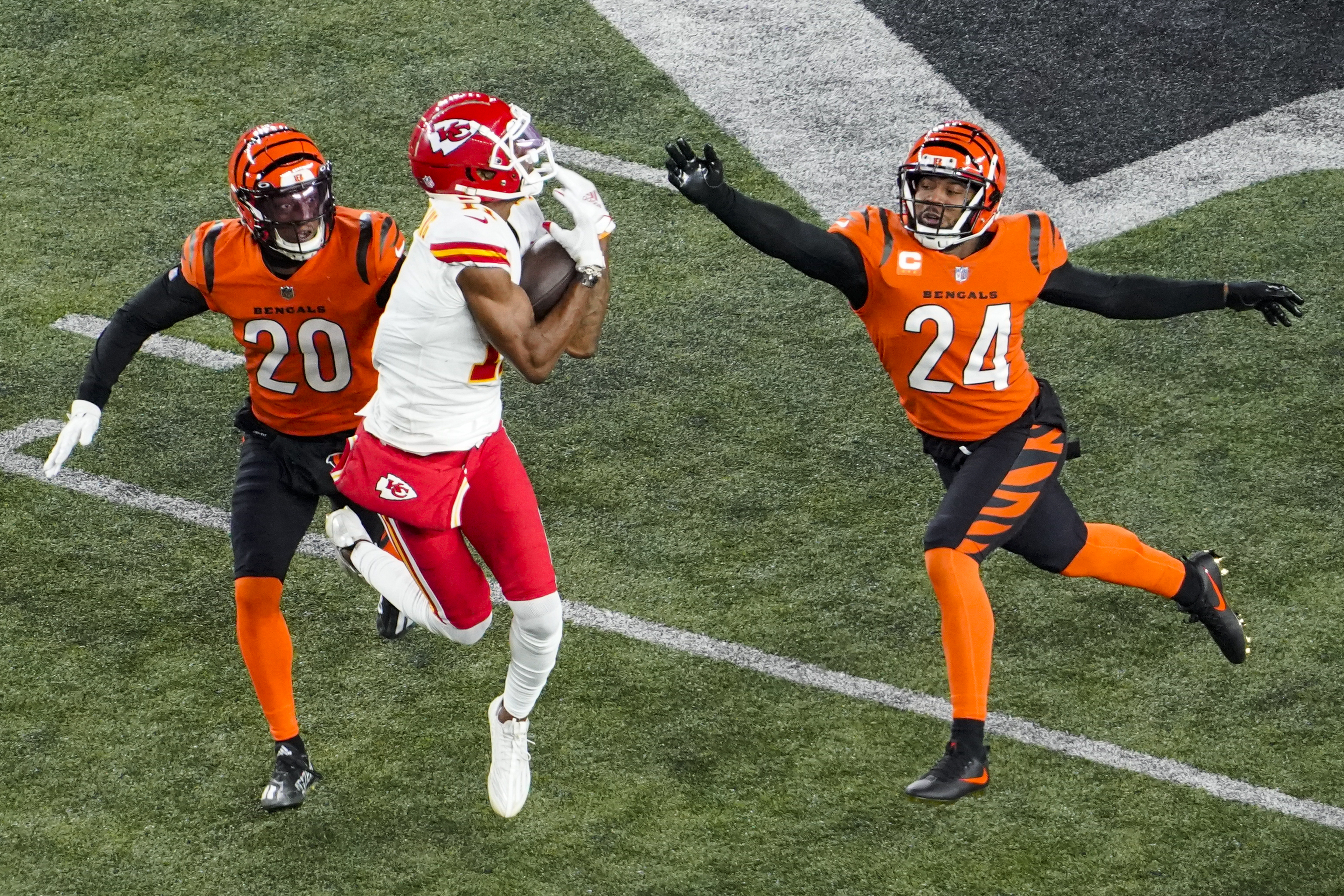 Cincinnati Bengals defensive end Sam Hubbard (94) celebrates with DJ Reader  (98) after making a sack during an NFL football game against the Kansas  City Chiefs, Sunday, Dec. 4, 2022, in Cincinnati. (