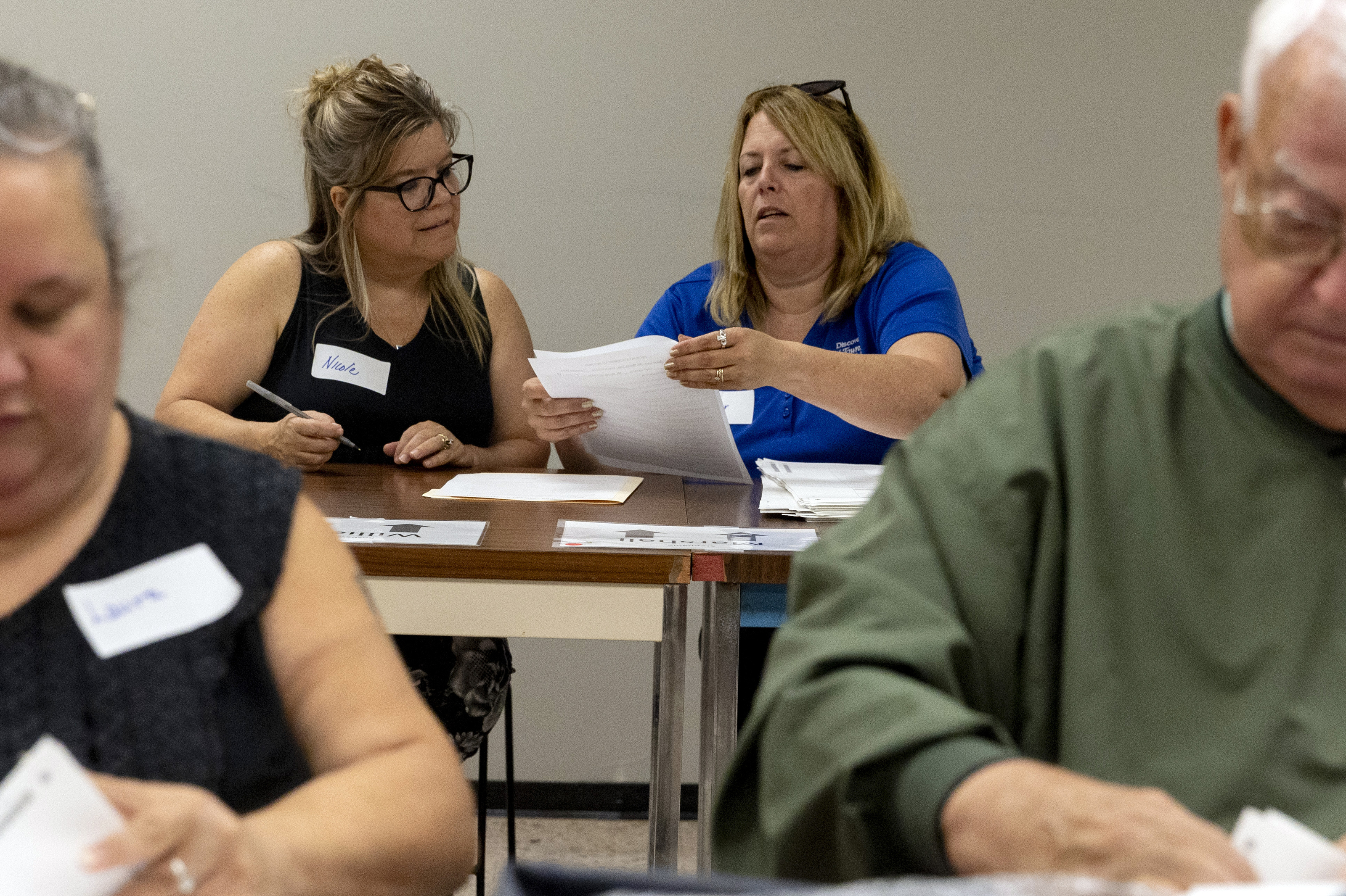 Election workers recount votes for two Genesee County ballots - mlive.com