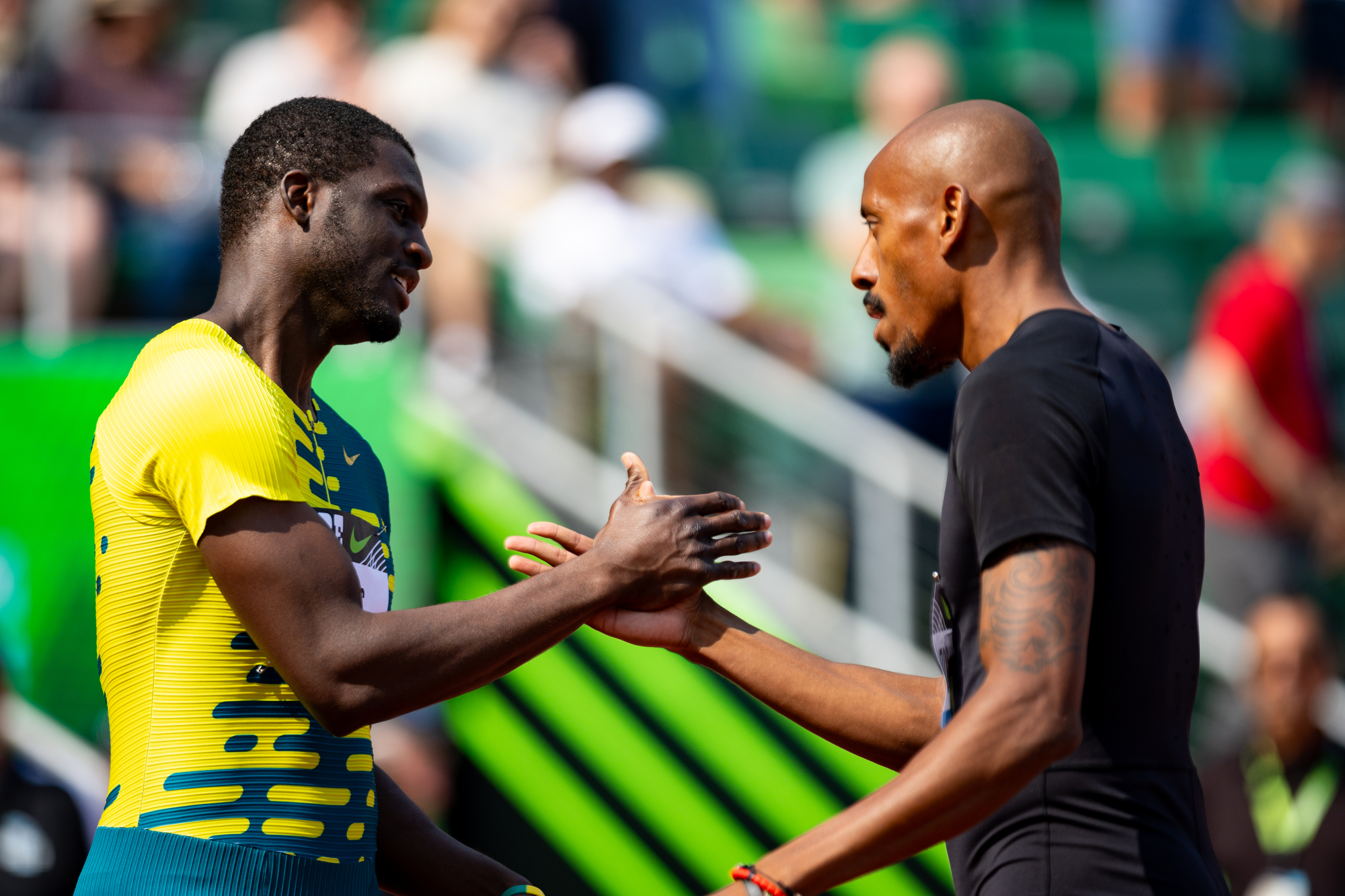 Winner Kirani James (left) of Grenada and third-place finisher Vernon Norwood shake hands after competing in the men’s 400 meters during the Prefontaine Classic track and field meet on Saturday, Sept. 16, 2023, at Hayward Field in Eugene.
