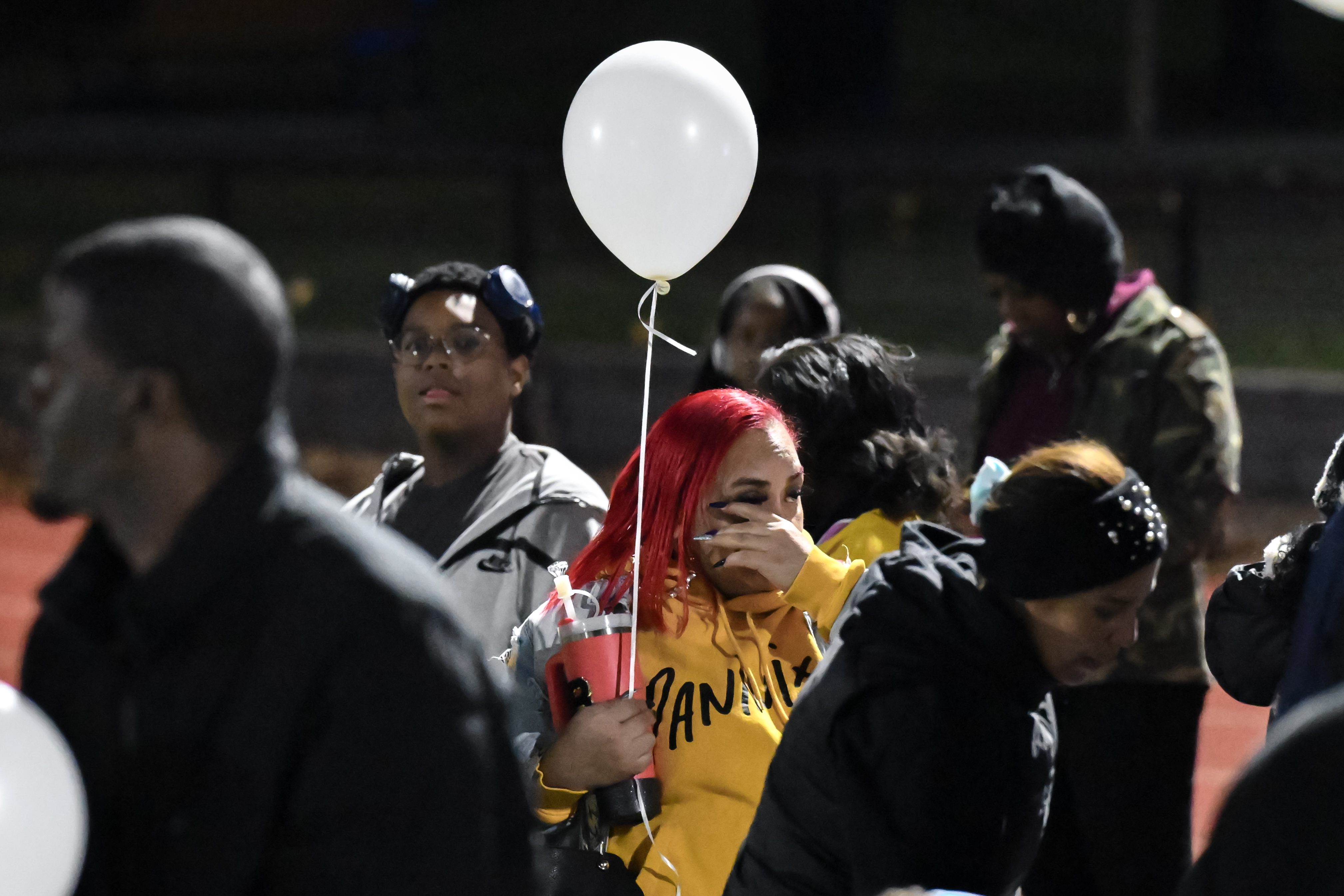 Community honors Newark shooting victims with a balloon release ...