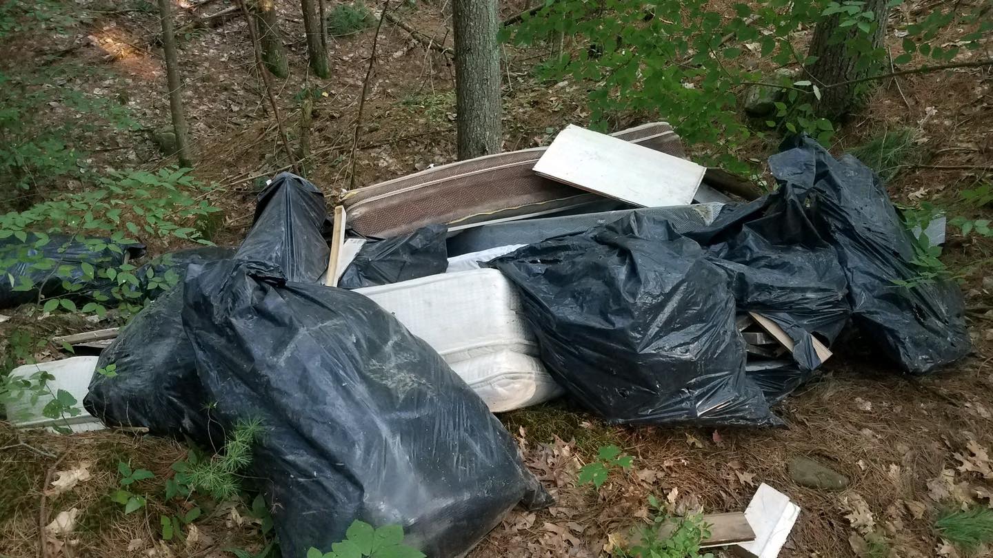 truckloads of dumped household trash in Monson