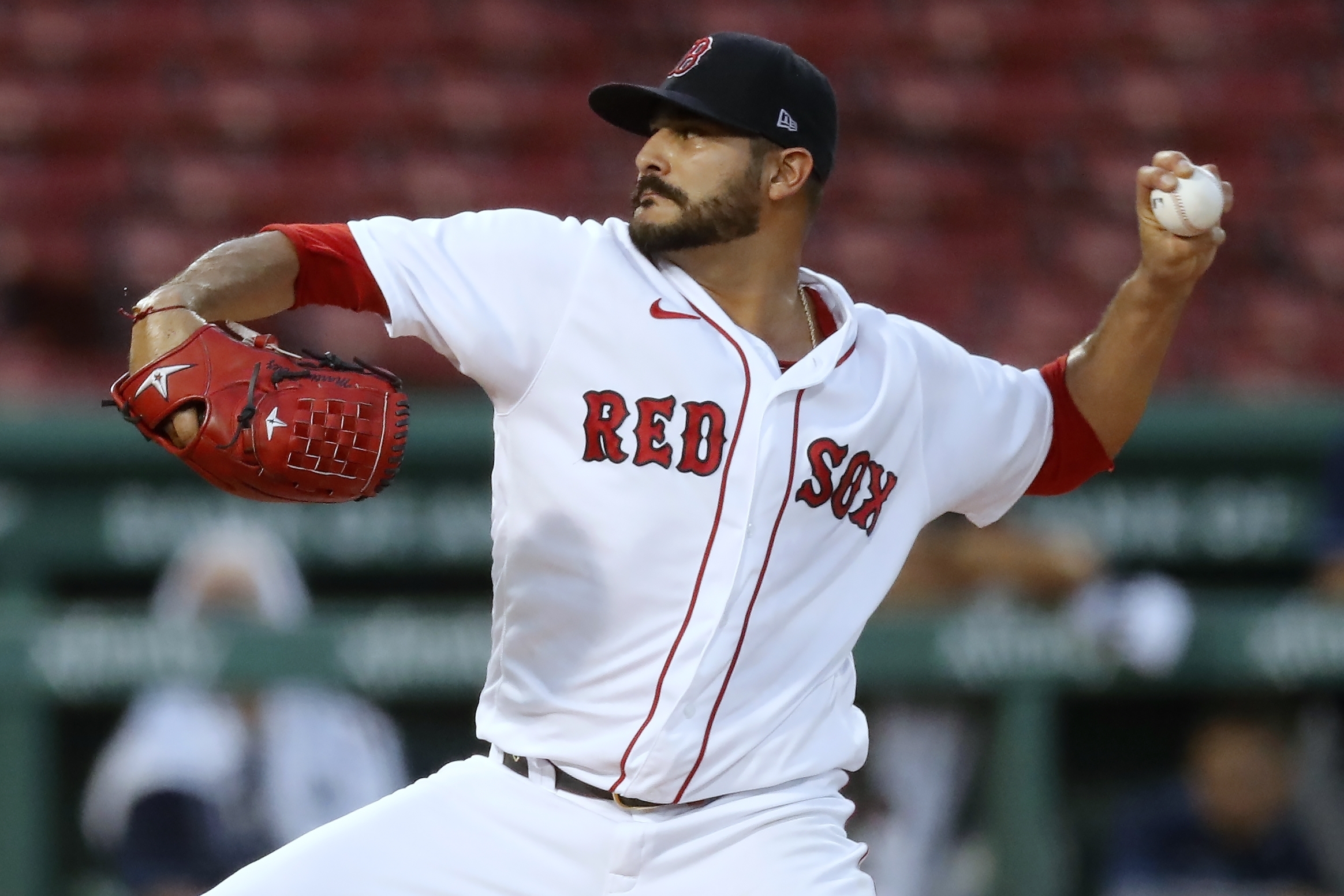 Boston Red Sox's Martin Perez makes cheese with hands at ranch