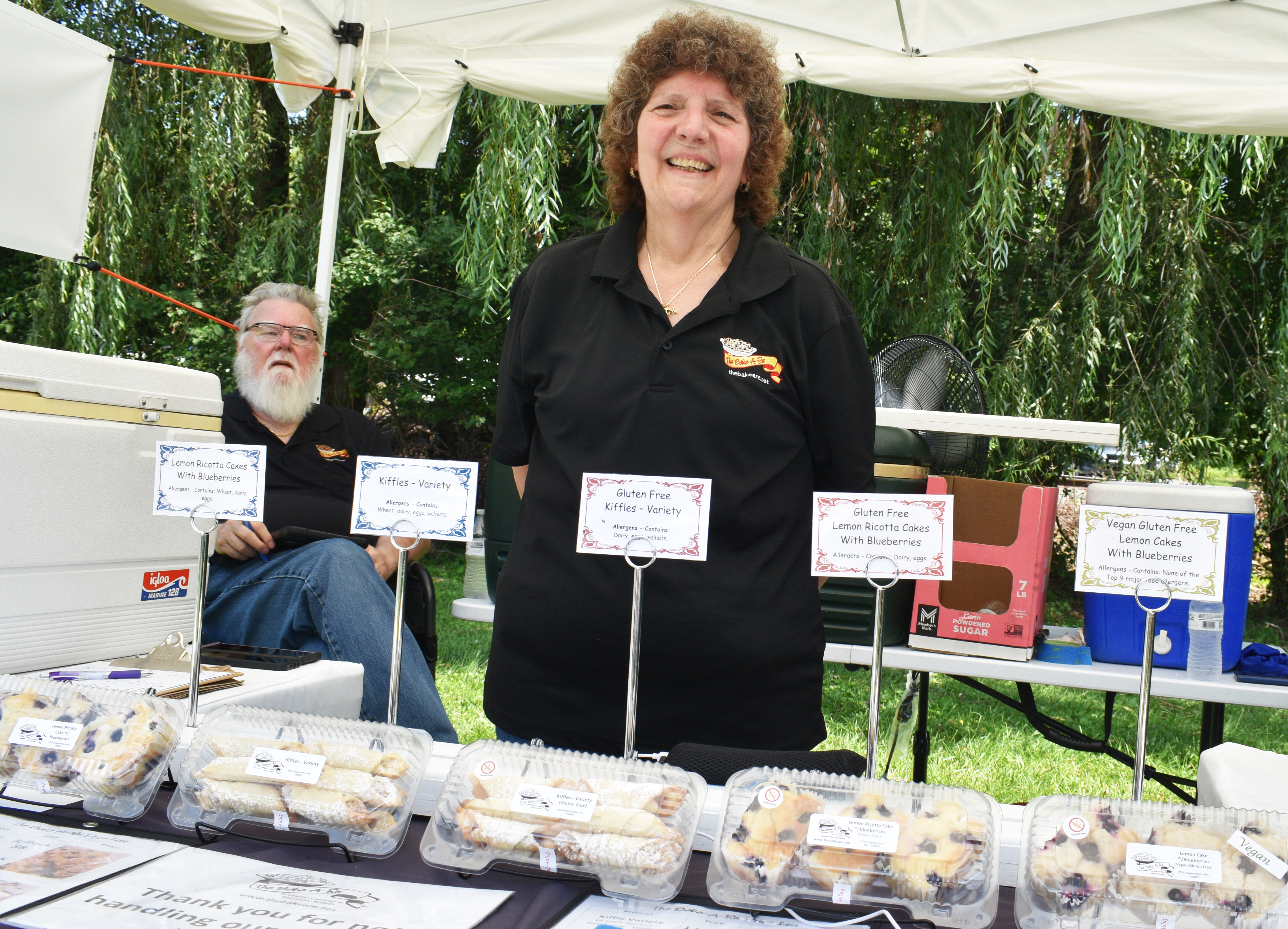 Marie Reiner sells traditional and gluten-free blueberry baked goods from her Bake-A-Re stand, based in Danielsville, Moore Township, as Historic Bethlehem Museums & Sites opens its two-day Blueberry Festival & Market To Go on Saturday, July 13, 2024, at Burnside Plantation. It continues Sunday.