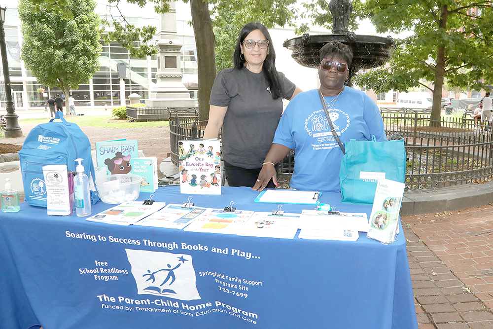 L to R- Emma Rodriguez and Cindy Stoval from the Springfield Family Support Program at Chalk for Change 2022 taking place at Court Square in Springfield on July 16th. (Ed Cohen Photo)