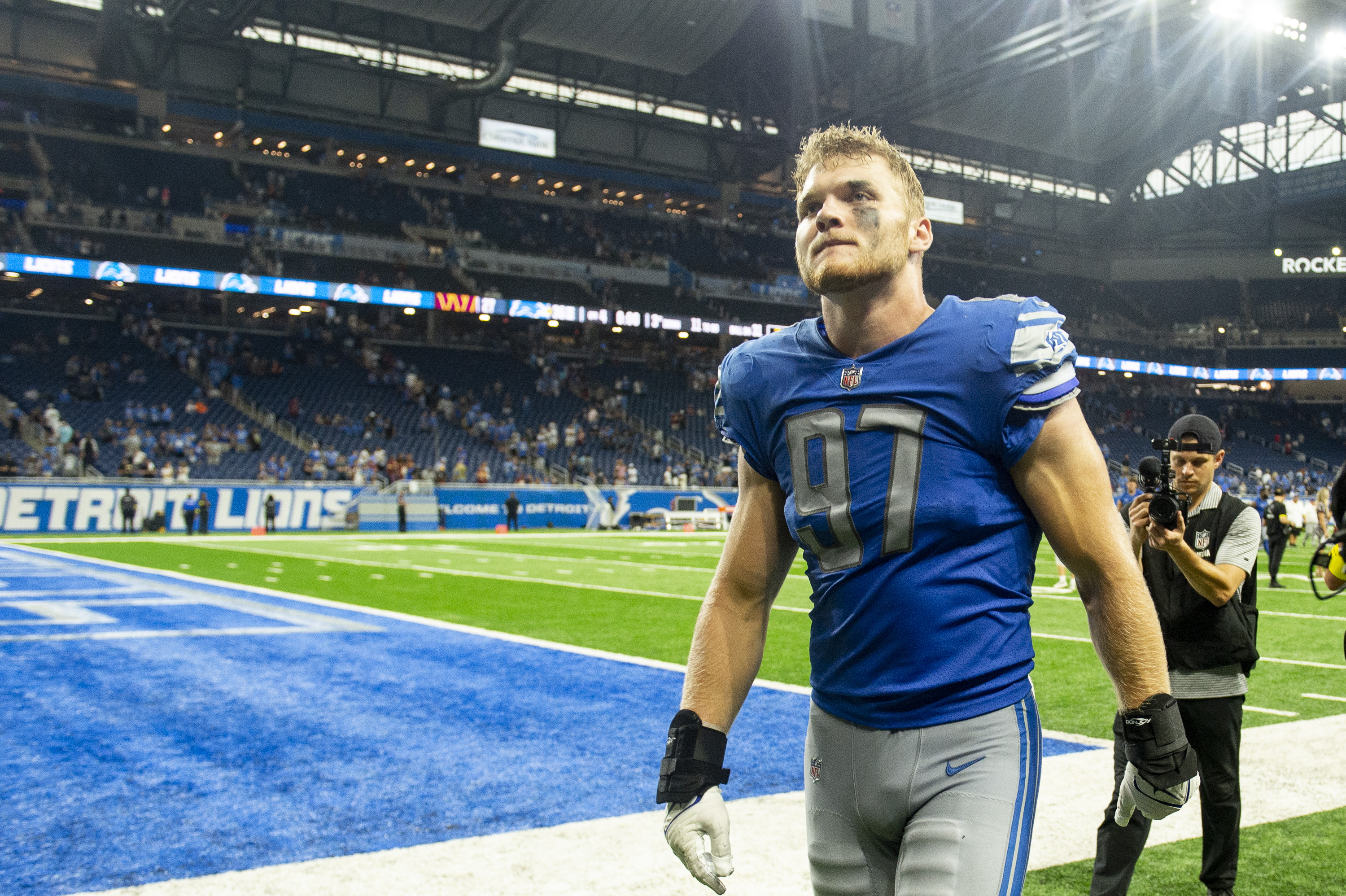 Detroit Lions defensive end Aidan Hutchinson (97) pursues a play on defense  against the Minnesota Vikings during an NFL football game, Sunday, Dec. 11,  2022, in Detroit. (AP Photo/Rick Osentoski Stock Photo - Alamy