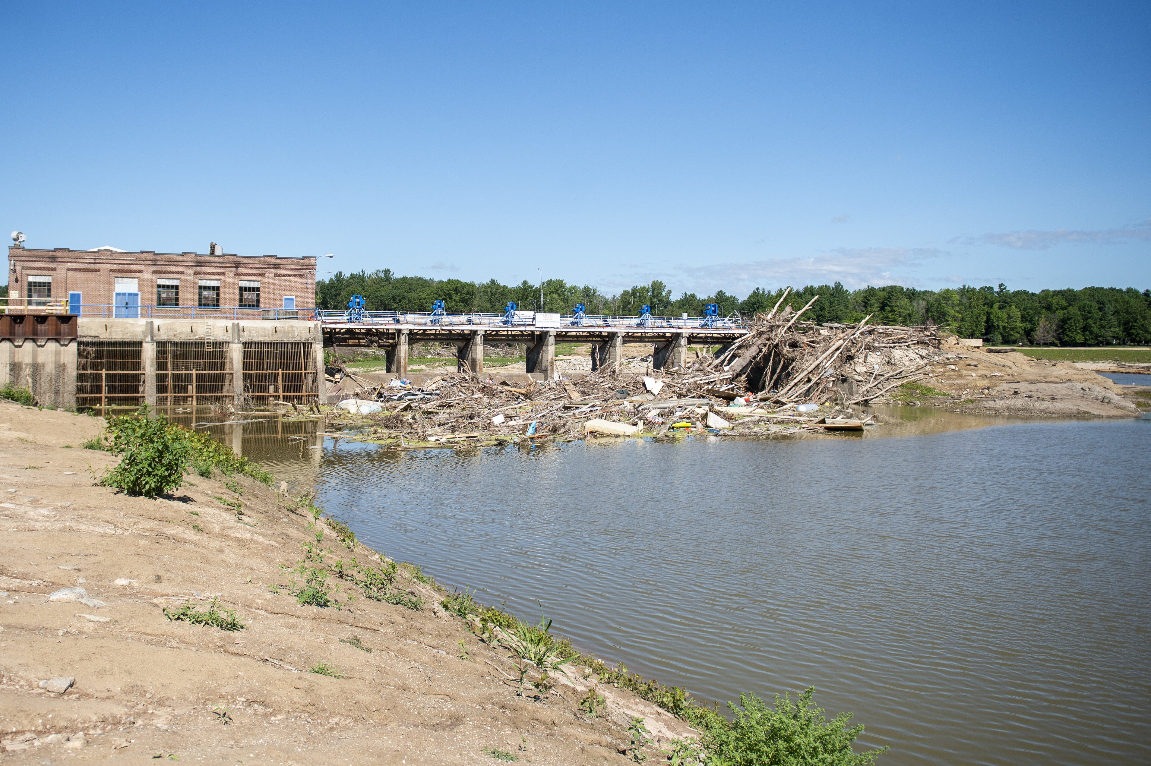 A view of the Sanford Dam in Sanford on Thursday, July 30, 2020. The devastating flood in May gushed over the majority of land in this area. (Kaytie Boomer | MLive.com)
