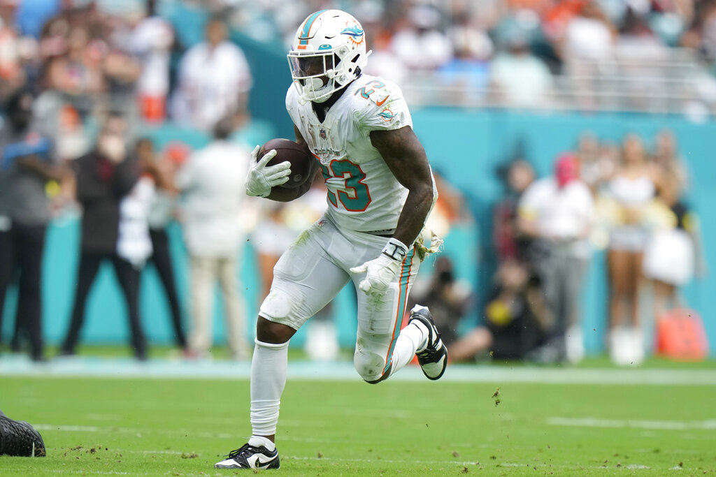 Miami Dolphins offense runs through the defense of the Cleveland Browns,  November 13, 2022 