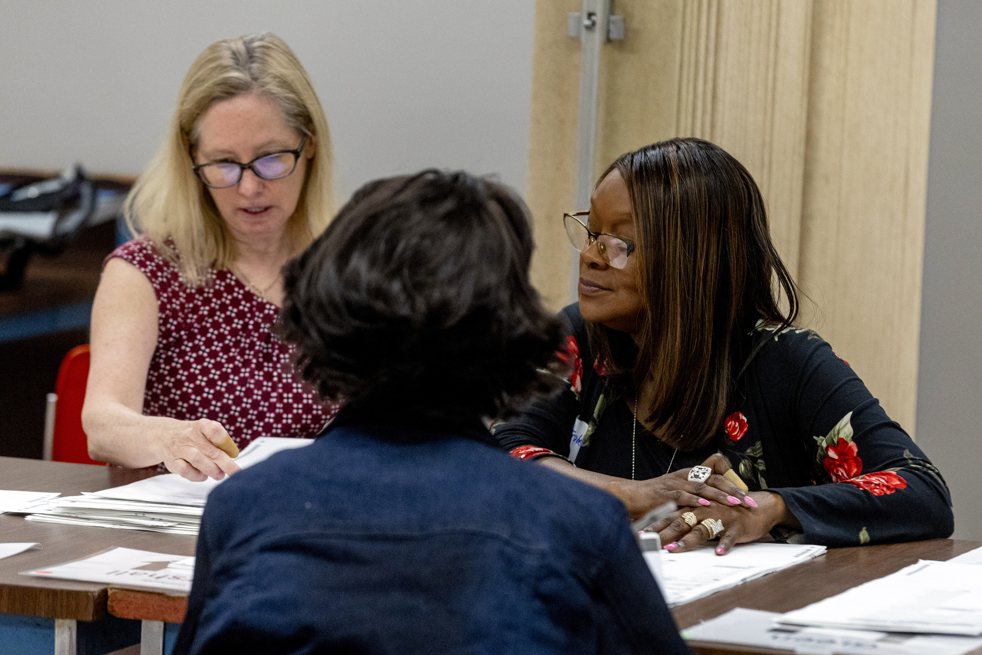 Election workers recount votes for two Genesee County ballots - mlive.com