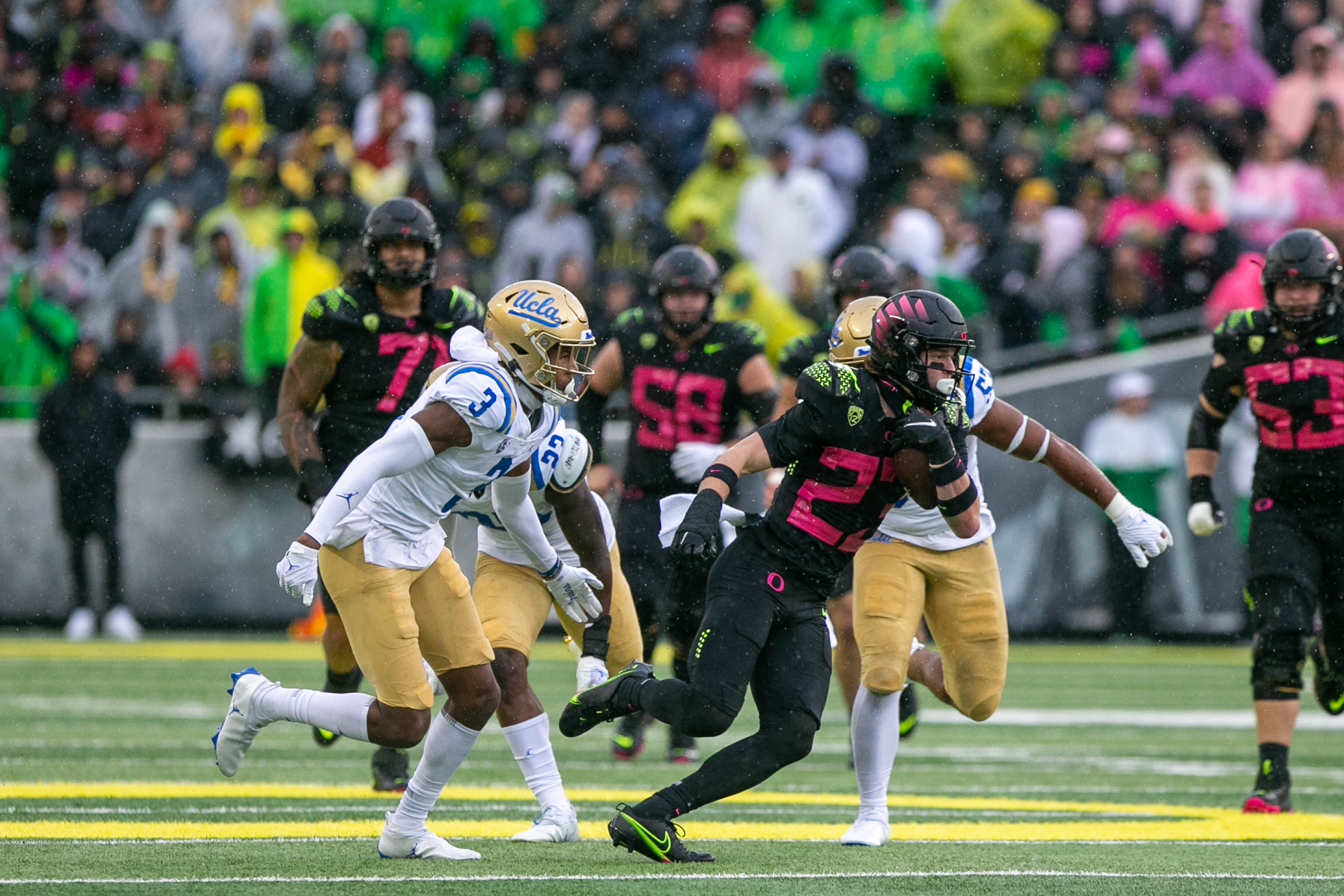 LOOK: Ducks bring back the pink 'Stomp Out Cancer' uniforms vs. UCLA
