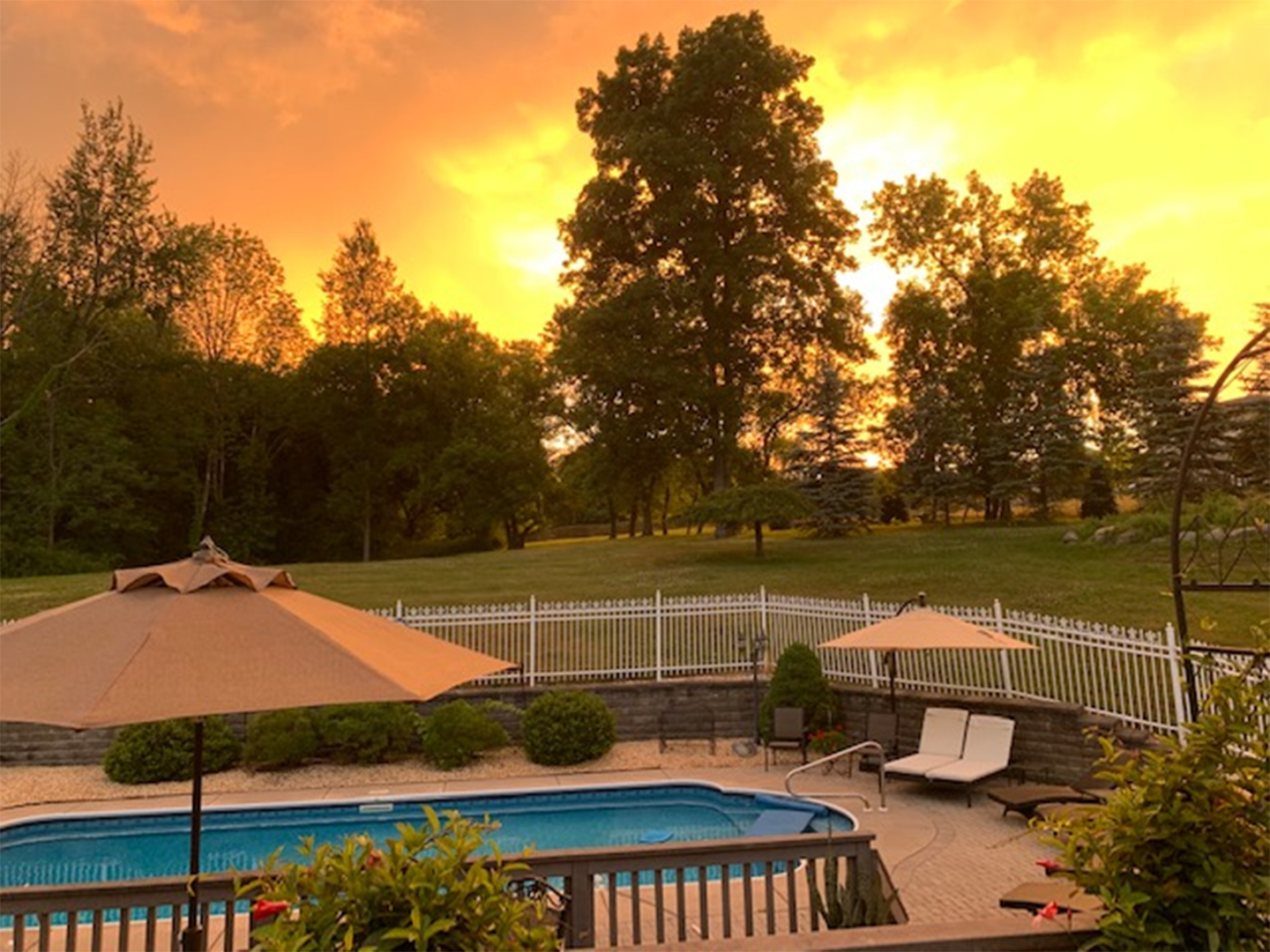 Brick Camillus home sits atop a hill overlooking six acres
