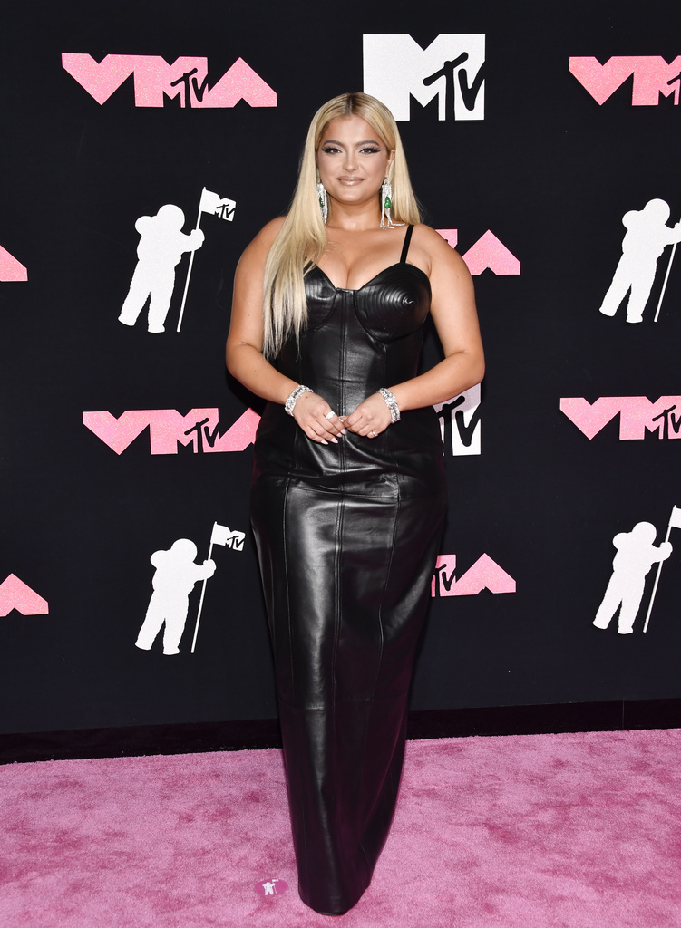 Bebe Rexha wears black leather dress with butt-baring cutouts to