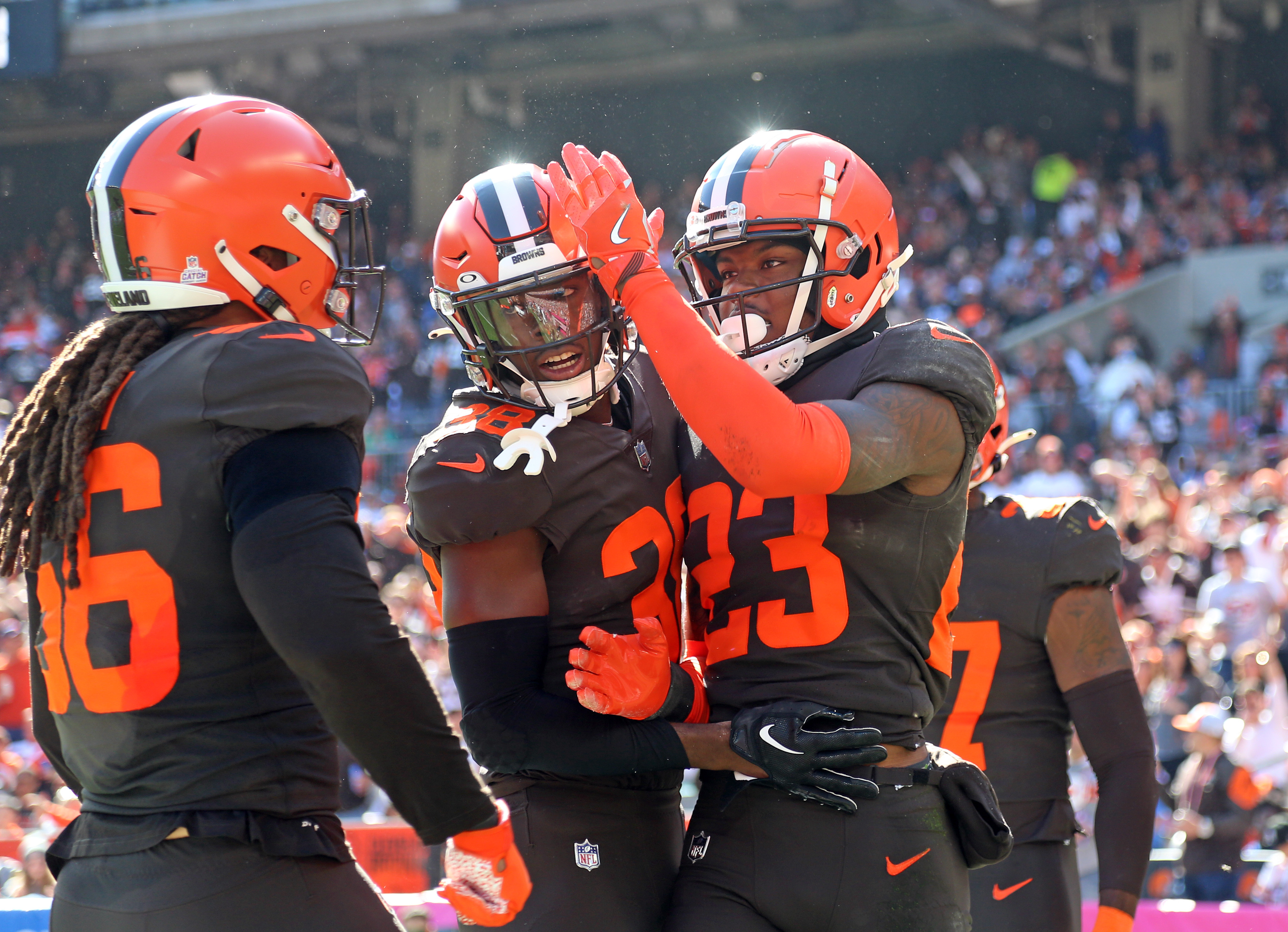 Cleveland Browns defensive end Isaac Rochell (98) runs after the