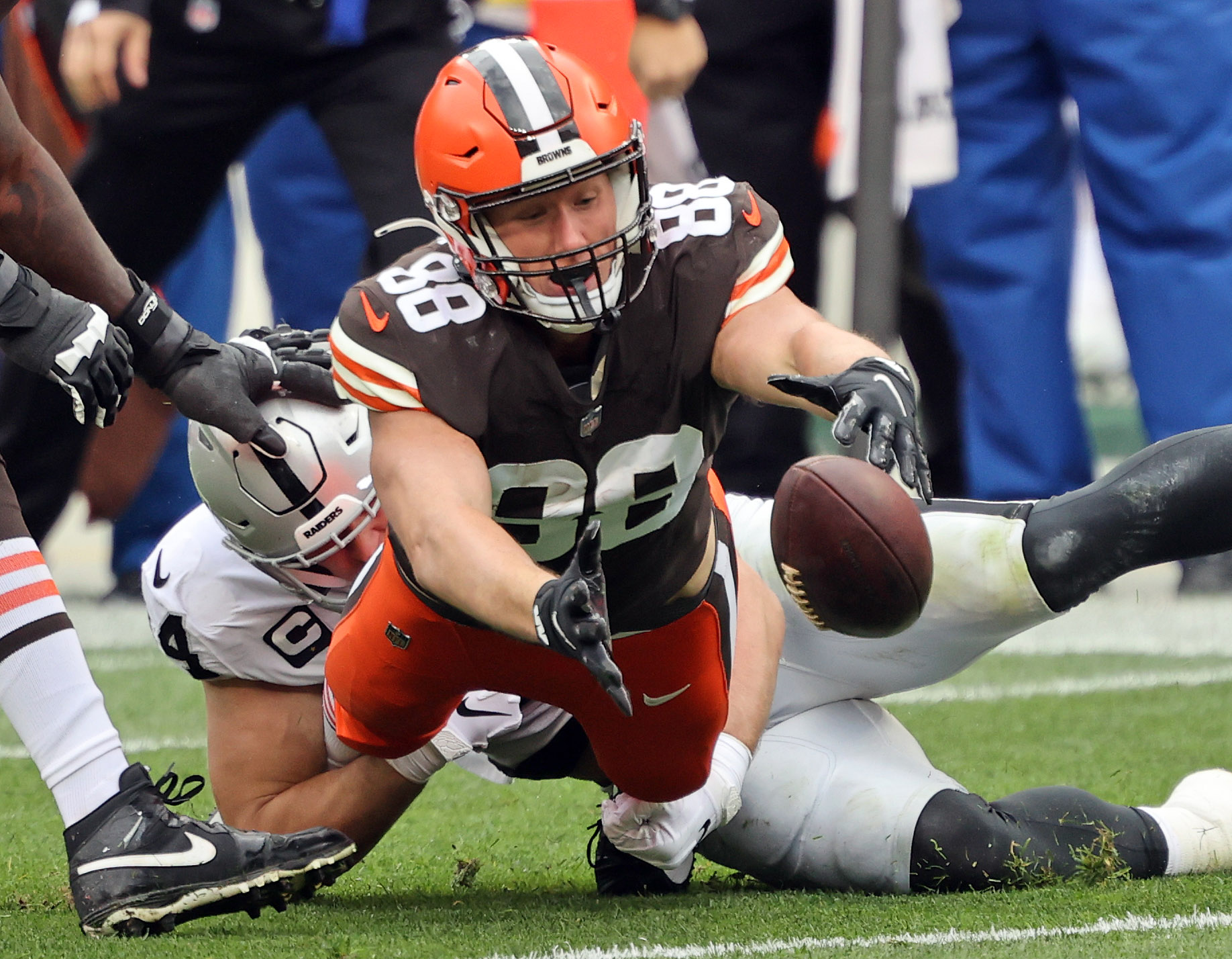 Cleveland Browns tight end Harrison Bryant (88) fumbles the football while  being tackled by Las …