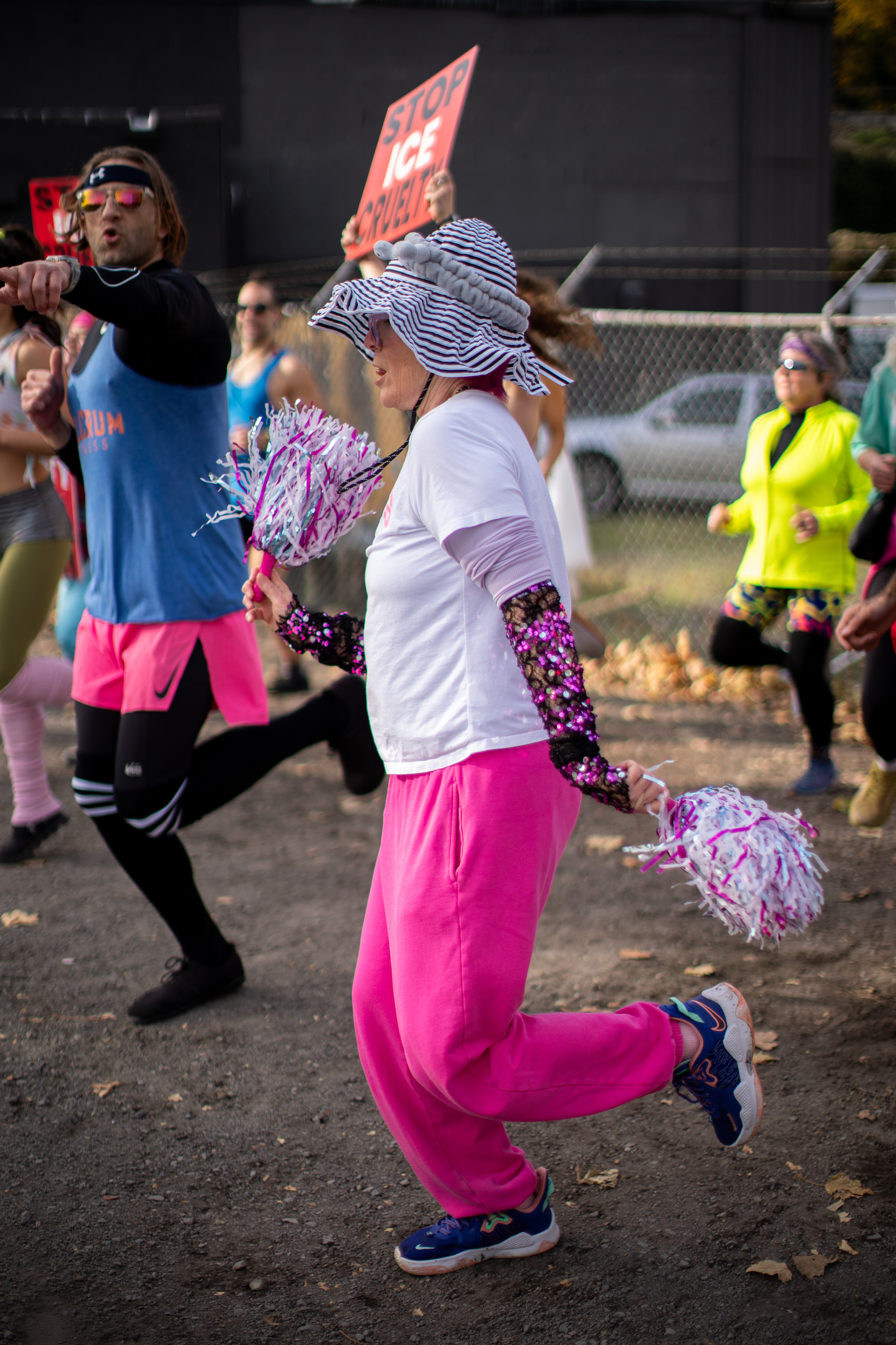 Participants in Fulcrum Fitness’s “Sweatin’ Out the Fascists” held an ’80s-aerobics peaceful protest outside the U.S. Immigration and Customs Enforcement (ICE) facility in South Portland on Sunday, Nov. 9, 2025, collecting donations for the Oregon Food Bank.