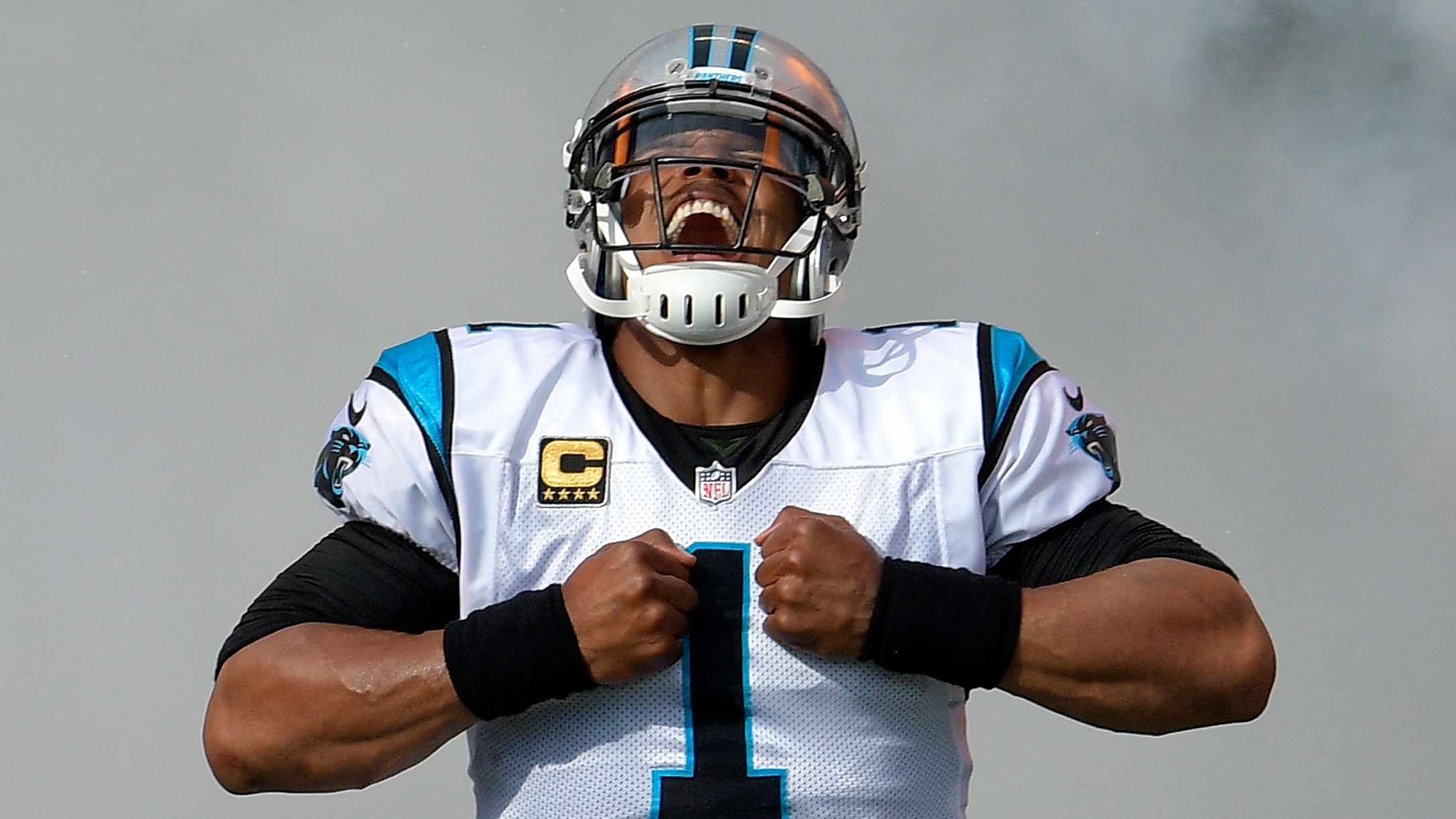 Former Patriots quarterback Cam Newton reunites with the Carolina