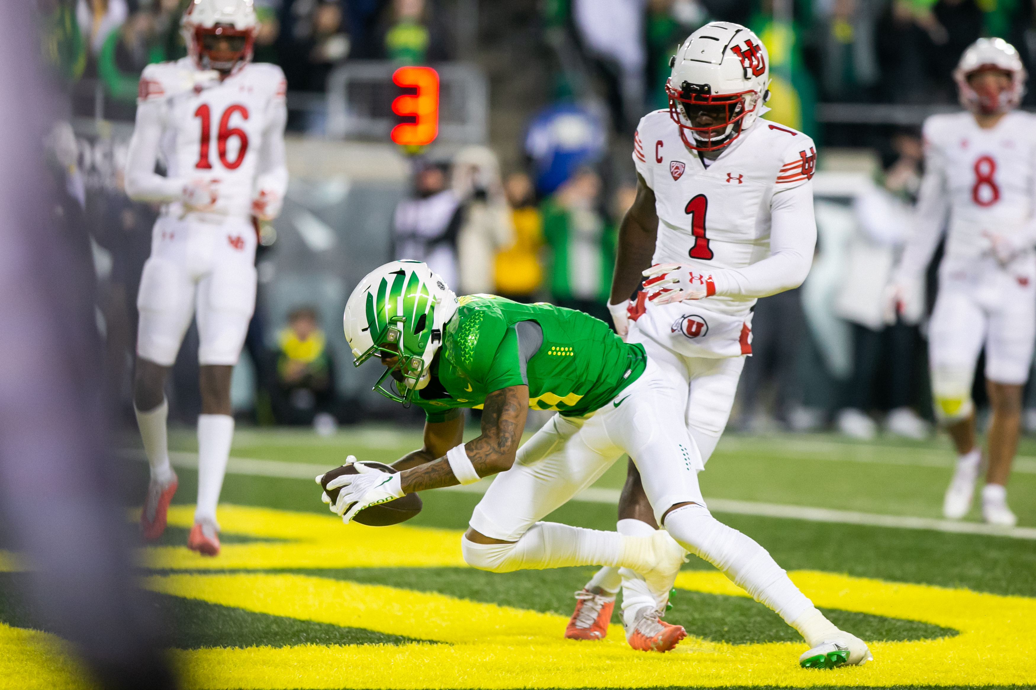 November 12 2022: Oregon Ducks quarterback Bo Nix (10)scores a touchdown in  the second quarter to tie the game at 10-10 as the Oregon Ducks and the  Washington Huskies battle at Autzen