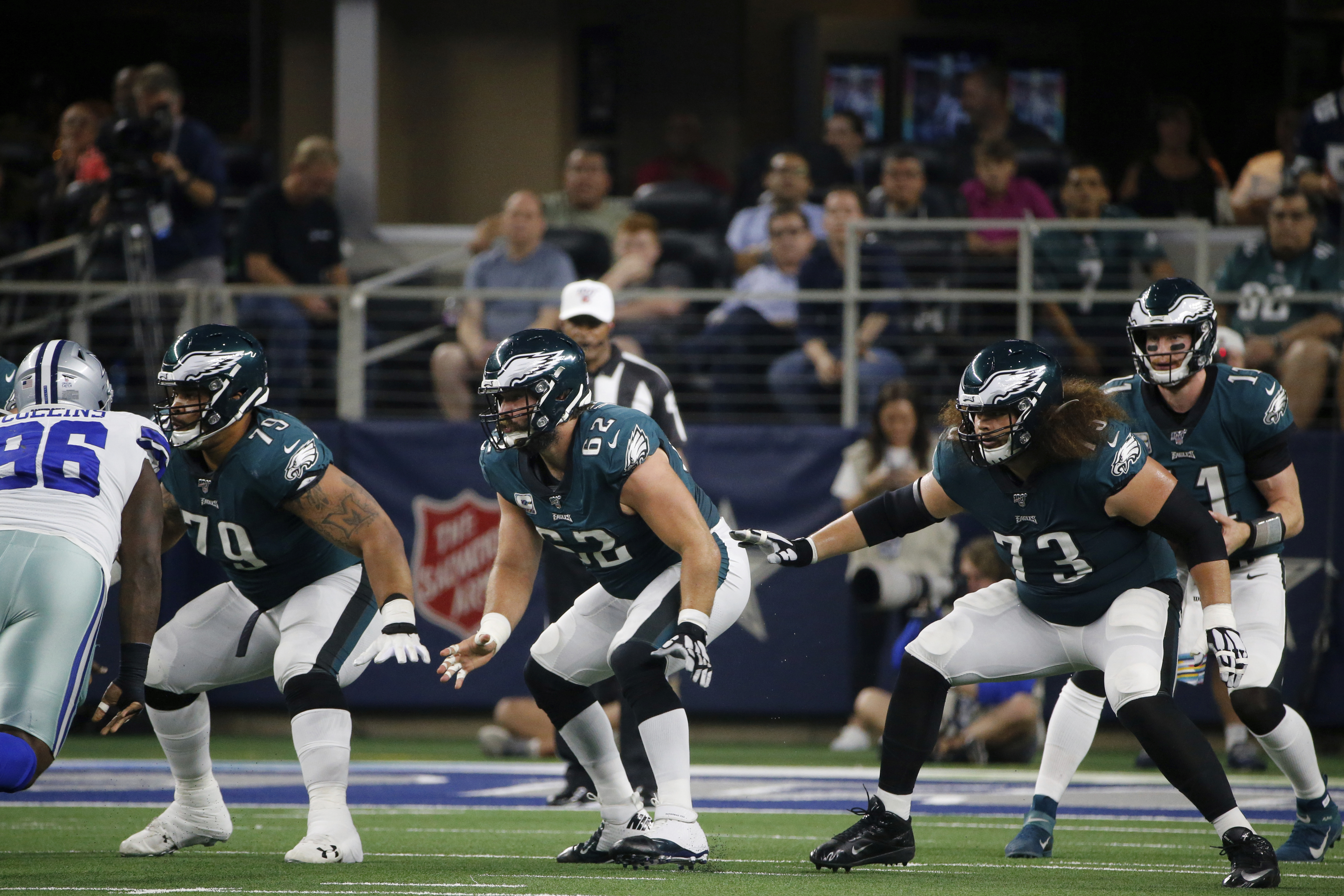 Philadelphia Eagles offensive guard Isaac Seumalo (73) looks at the  scoreboard replay of a fumble his team returned for a touchdown in the  fourth quarter against the Washington Redskins at FedEx Field