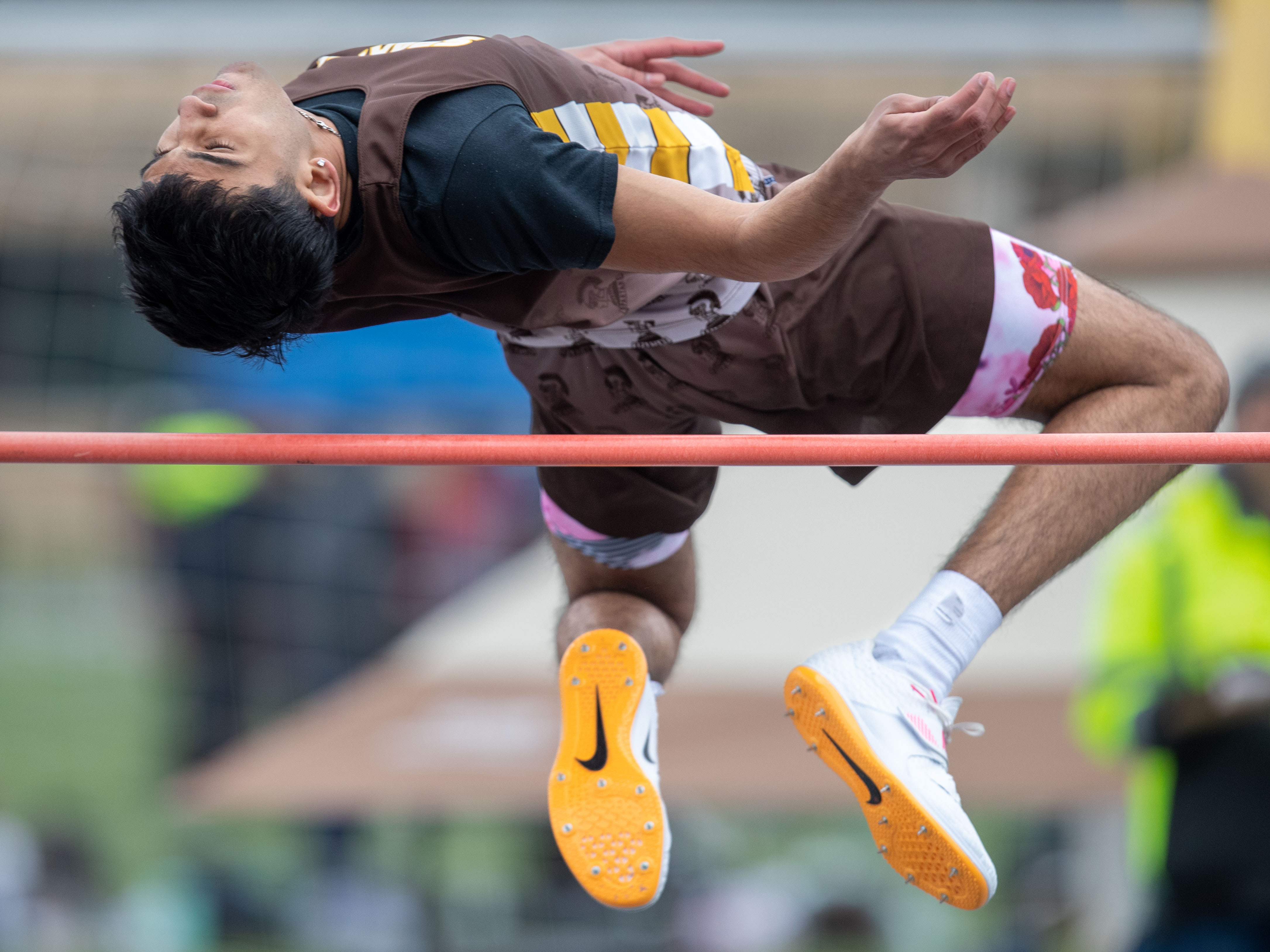 Milton Hershey’s Aryan Sandhu clears 5’8” in the high jump at the 2023 Tim Cook Memorial Invitational track & field meet at Chambersburg, Pa., Mar. 25, 2023.Mark Pynes | pennlive.com