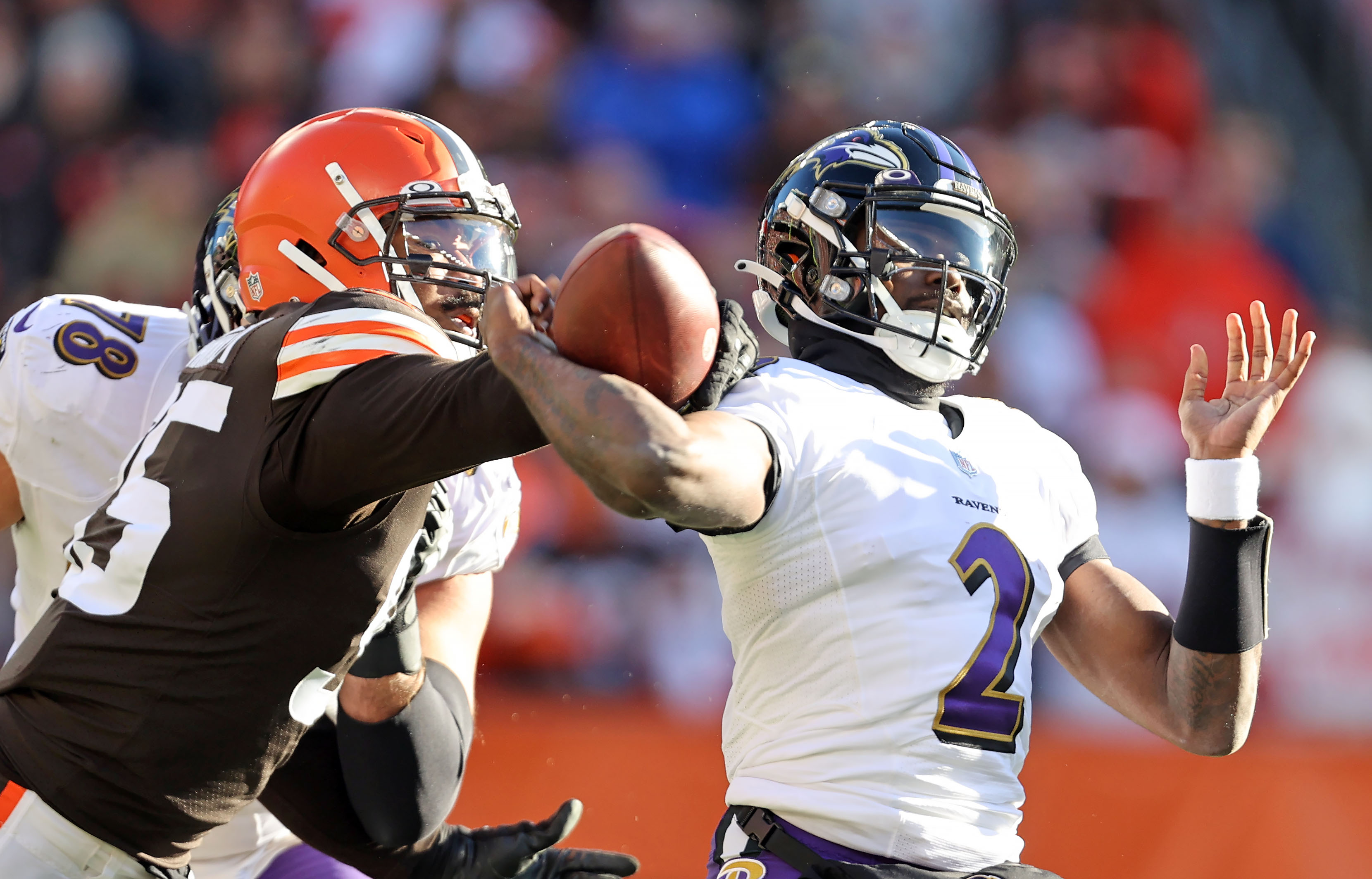 Baltimore Ravens cornerback Brandon Stephens (21) reacts to a deflected  pass during the first half of