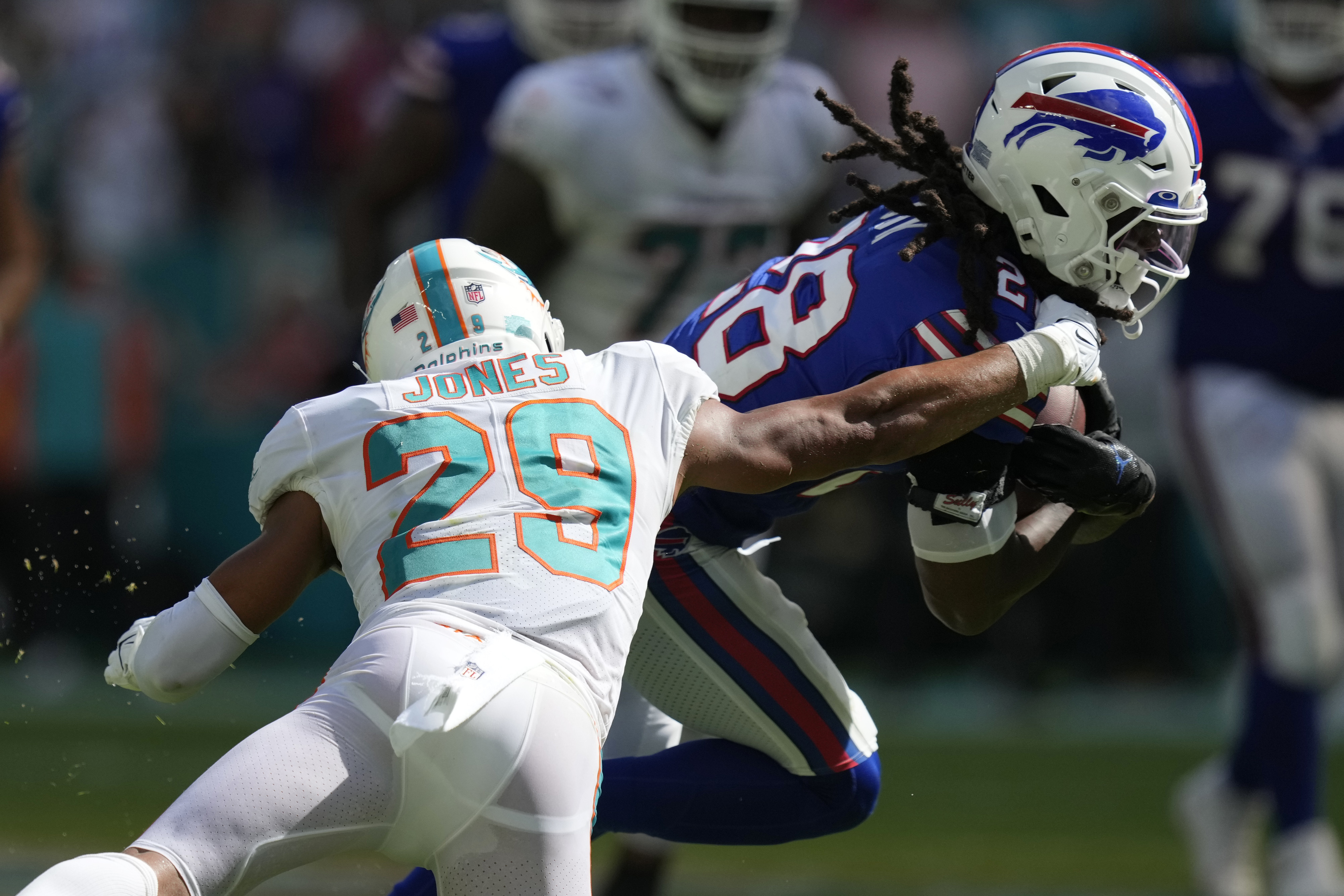 Tua Tagovailoa's career day lifts Miami Dolphins past Baltimore Ravens in  shocking 42-38 come-from-behind win — Phinsider Radio: nfl buffalo bills  men's short sleeve bi-blend t-shirt A Miami Dolphins Podcast