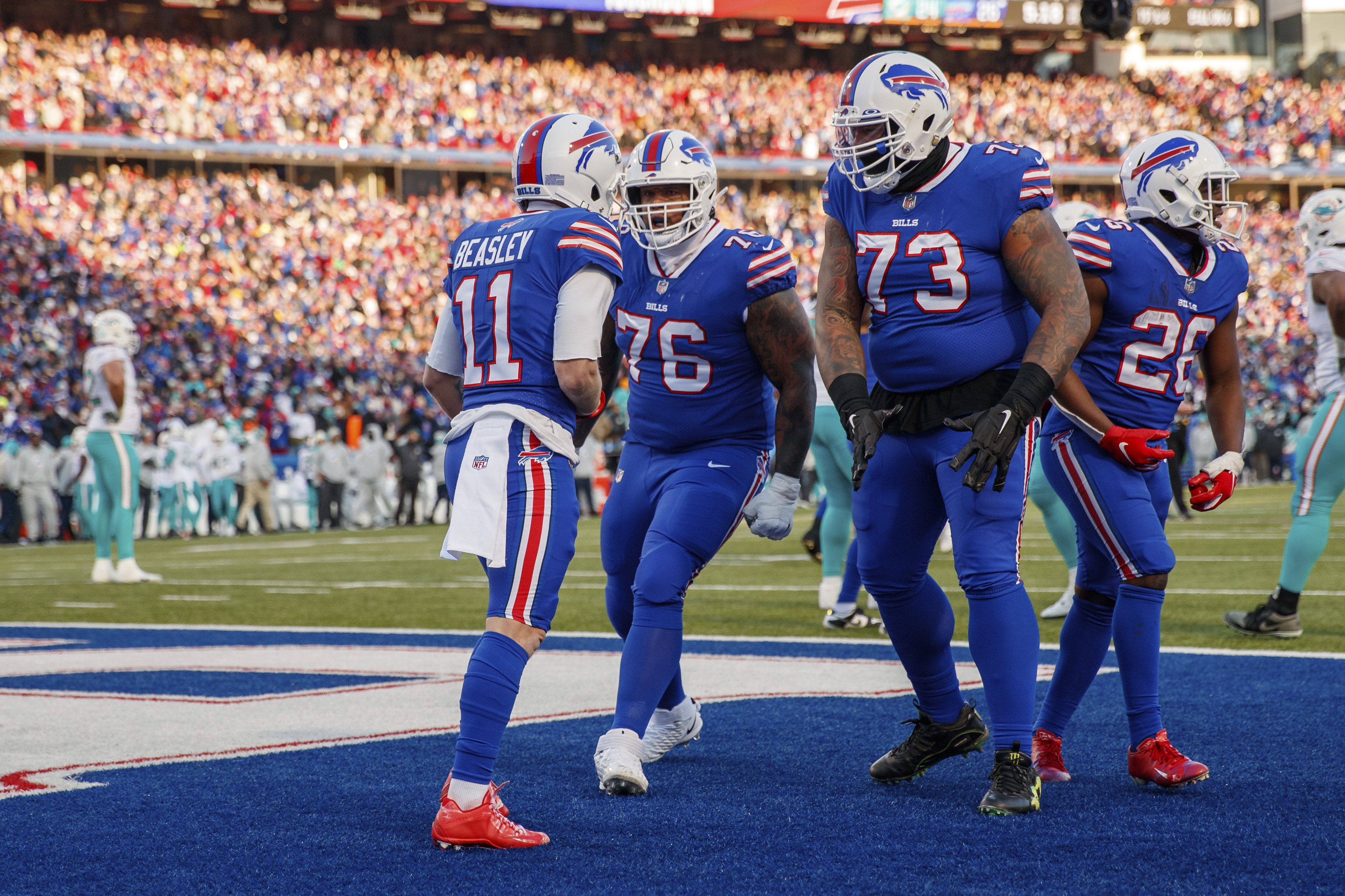 Buffalo Bills offensive tackle Dion Dawkins (73) greets fans after