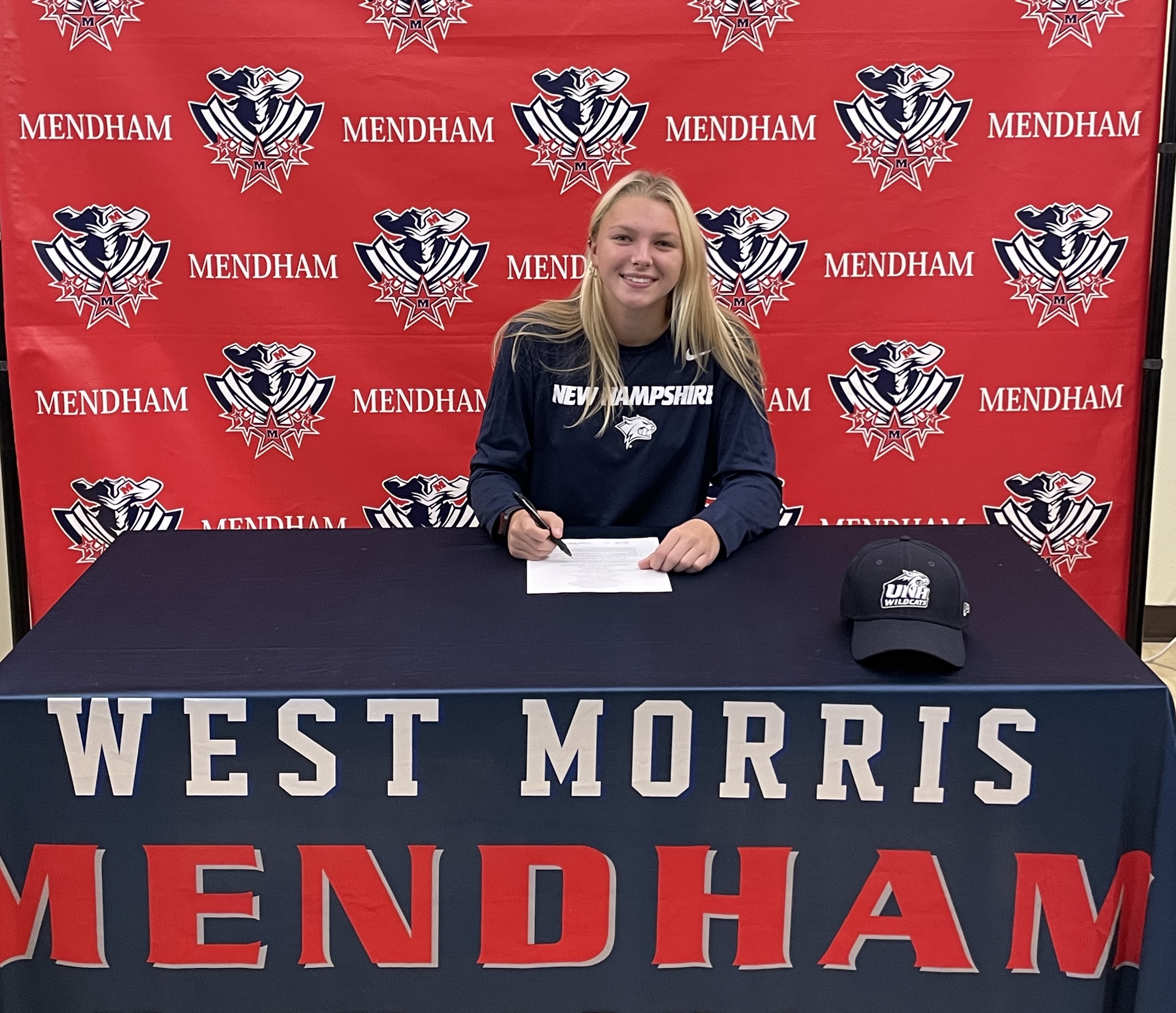 Sonja Zeepvat of Mendham signs her National Letter of Intent to play soccer at the University of New Hampshire.