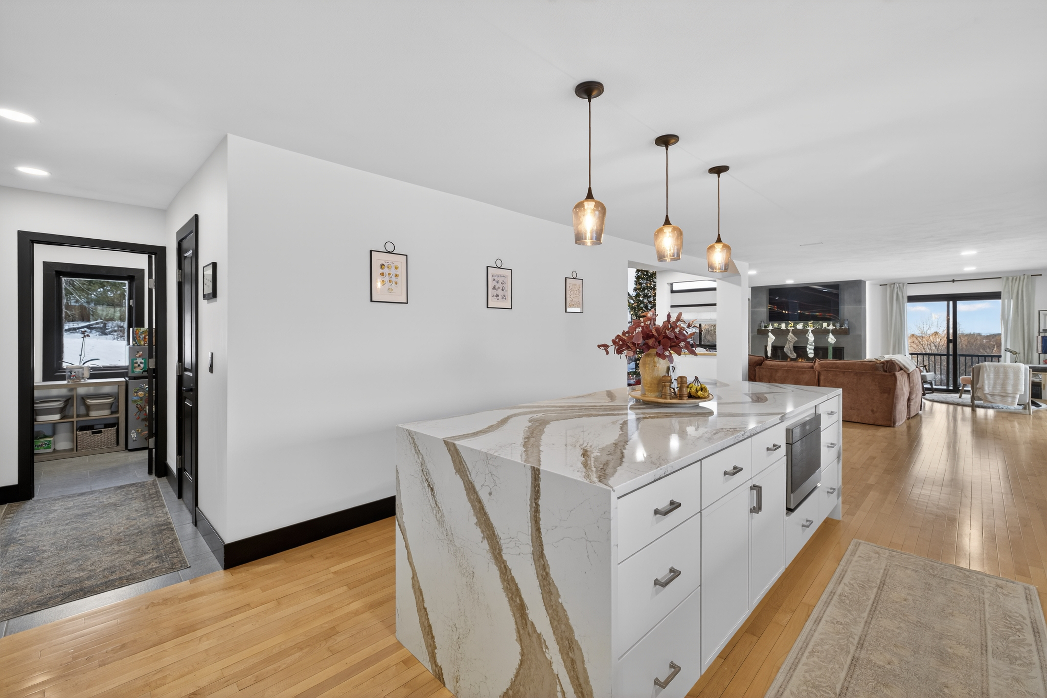 - Christina Cianciosi grew up admiring the house at 101 Alton Street in Syracuse which borders Bellevue Country Club. In 2022, she bought the unique home and gave it an extensive renovation. The renovated kitchen's proximity to the living room makes it perfect for entertaining. "The TV remote lives on" the 12-foot quartz island, Cianciosi said. Courtesy of Kyle Fedrizzi, owner of kfotography315, LLC.