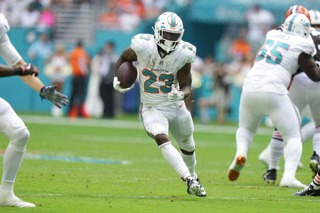 Miami Dolphins offense runs through the defense of the Cleveland Browns, November  13, 2022 