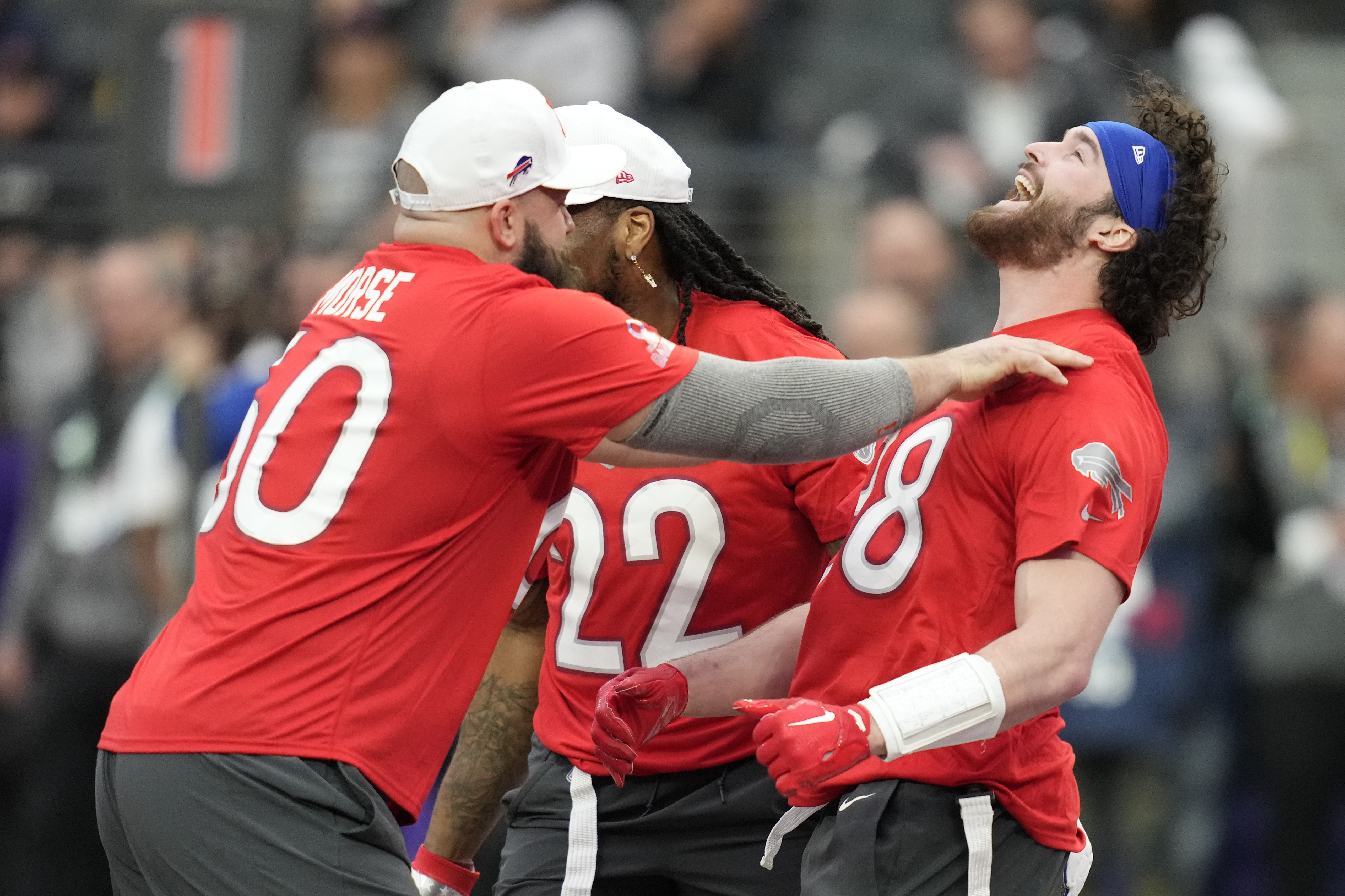 NFC tight end George Kittle (85) of the San Francisco 49ers celebrates a  touchdown with NFC wide receiver Justin Jefferson of the Minnesota Vikings  during the flag football event at the NFL