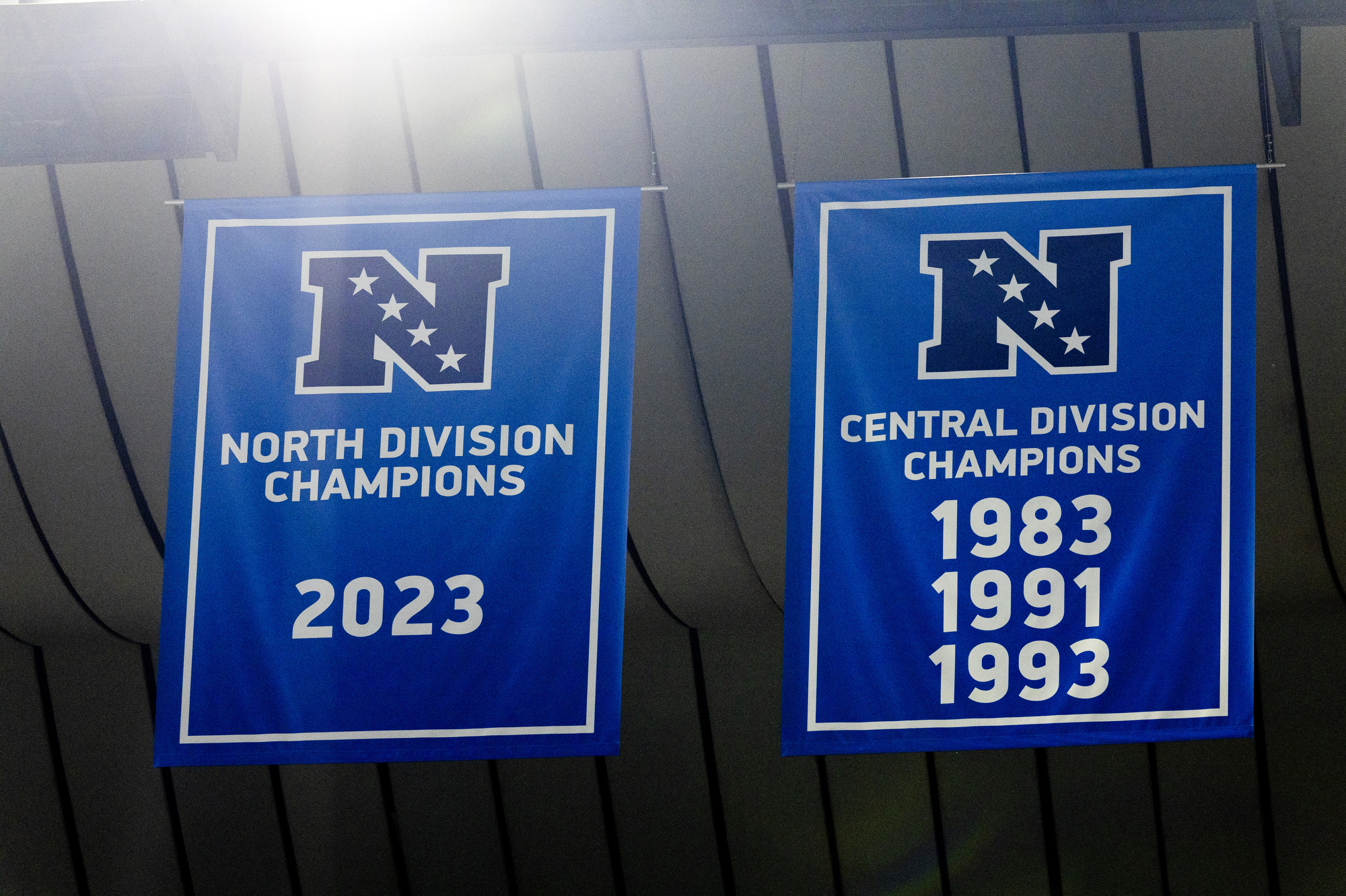 A fresh NFC North Division Champion banner is displayed at left during the last regular season game against the Minnesota Vikings on Sunday, Jan. 7, 2024 at Ford Field in Detroit.