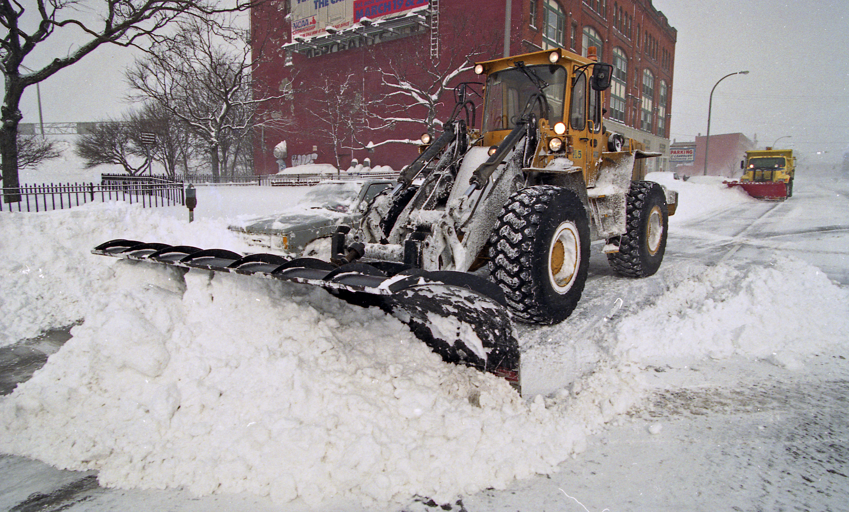 James Kelly, with the Syracuse DPW, plows out 300 Block of North Salina Street, Syracuse, following the Blizzard of 1993.
