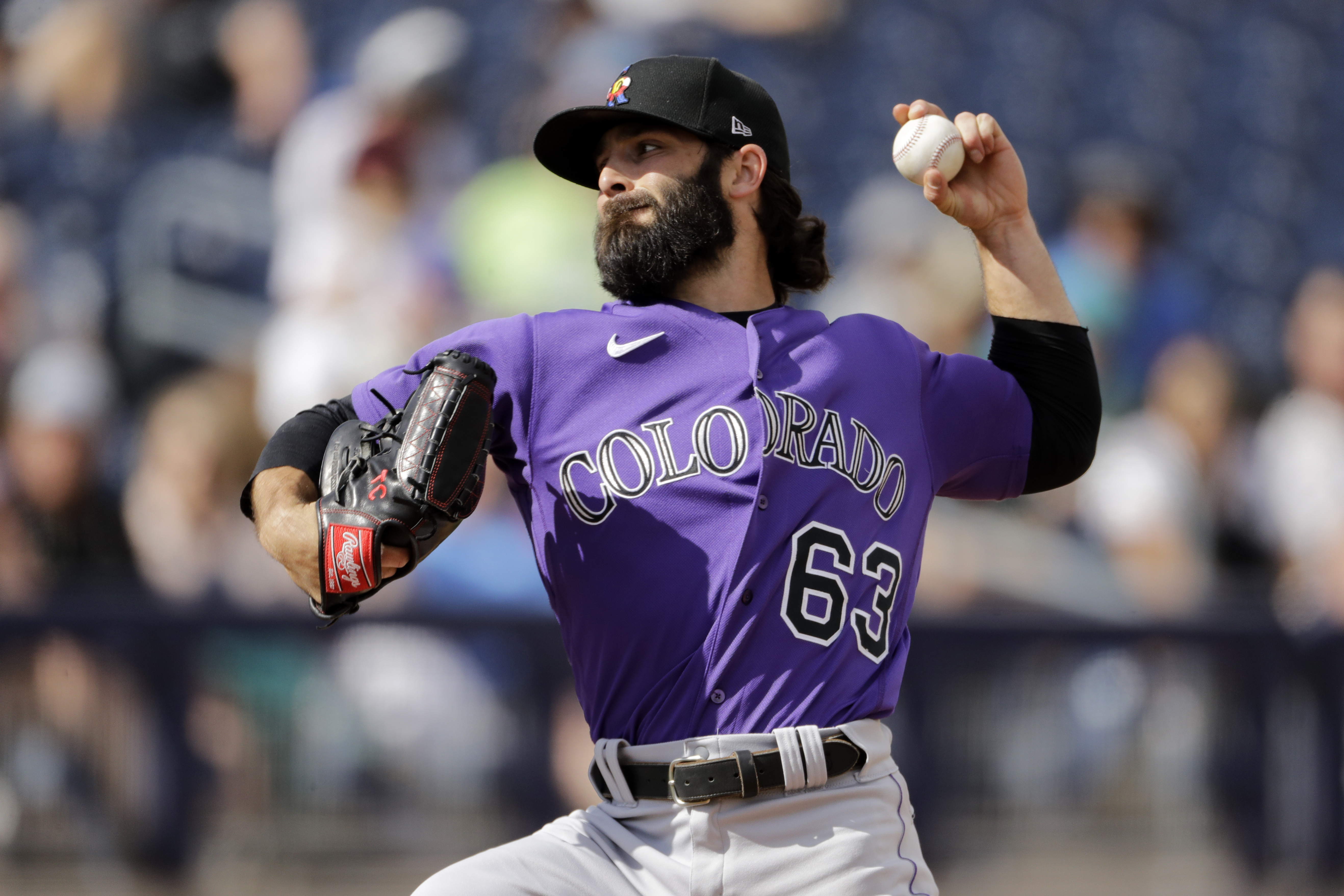 Rockies' pitchers show off basketball jerseys