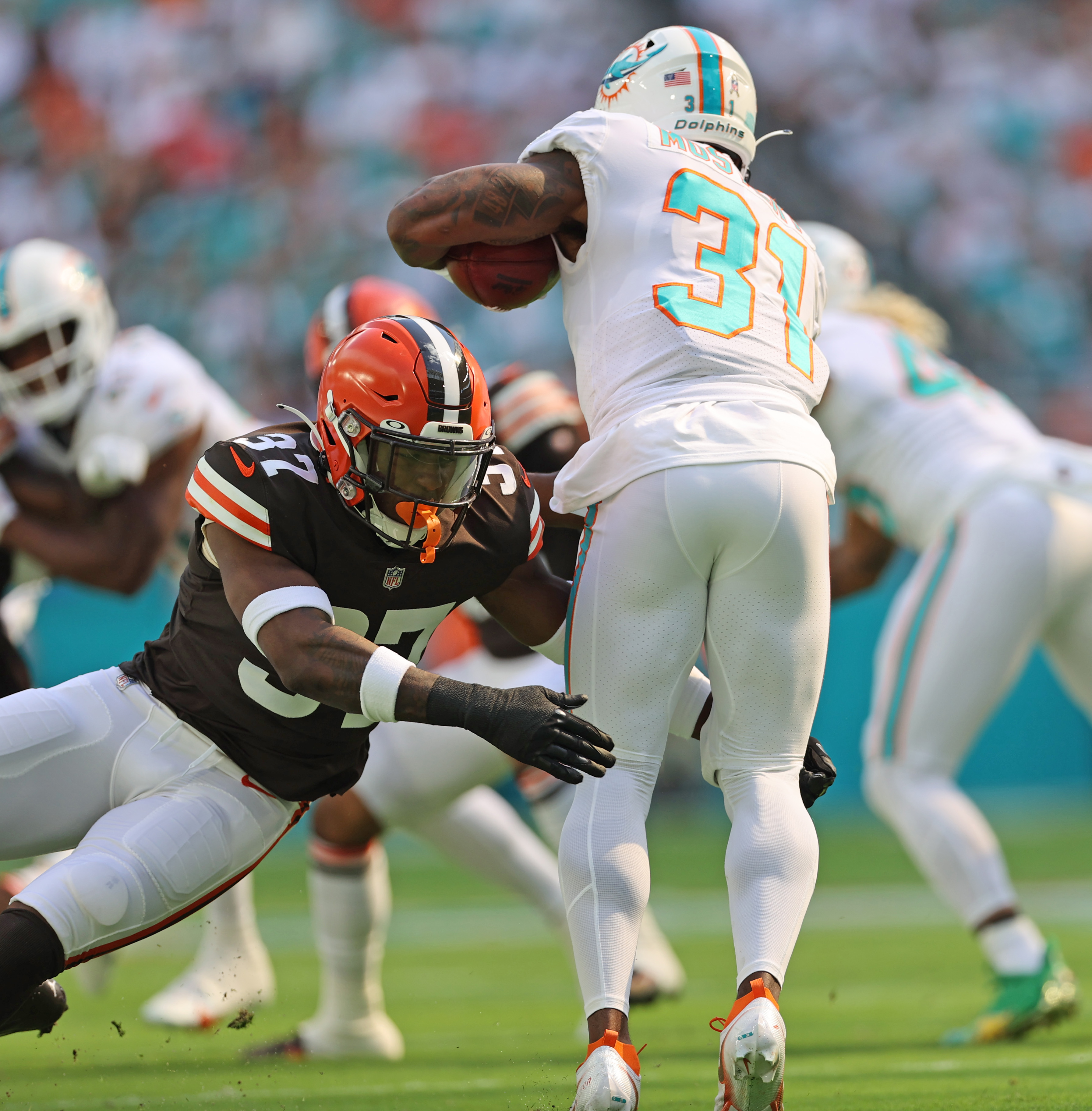 Miami Dolphins running back Raheem Mostert (31) runs for a touchdown during  the second half of an NFL football game against the Cleveland Browns,  Sunday, Nov. 13, 2022, in Miami Gardens, Fla. (