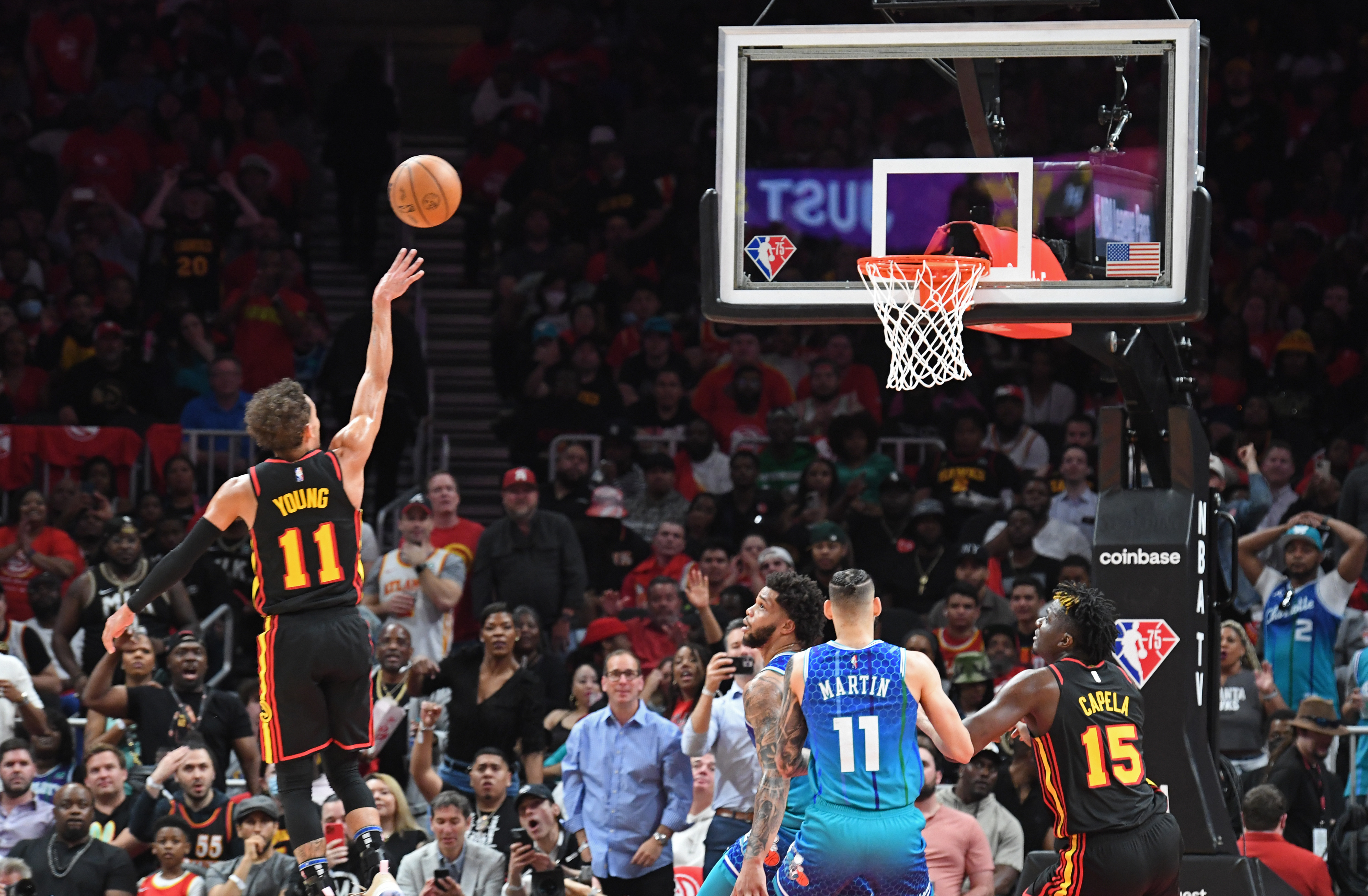Hawks guard Trae Young (11) goes up for a shot during the second half in the NBA play-in tournament at State Farm Arena on Wednesday, April 13, 2022. (Hyosub Shin / Hyosub.Shin@ajc.com)
