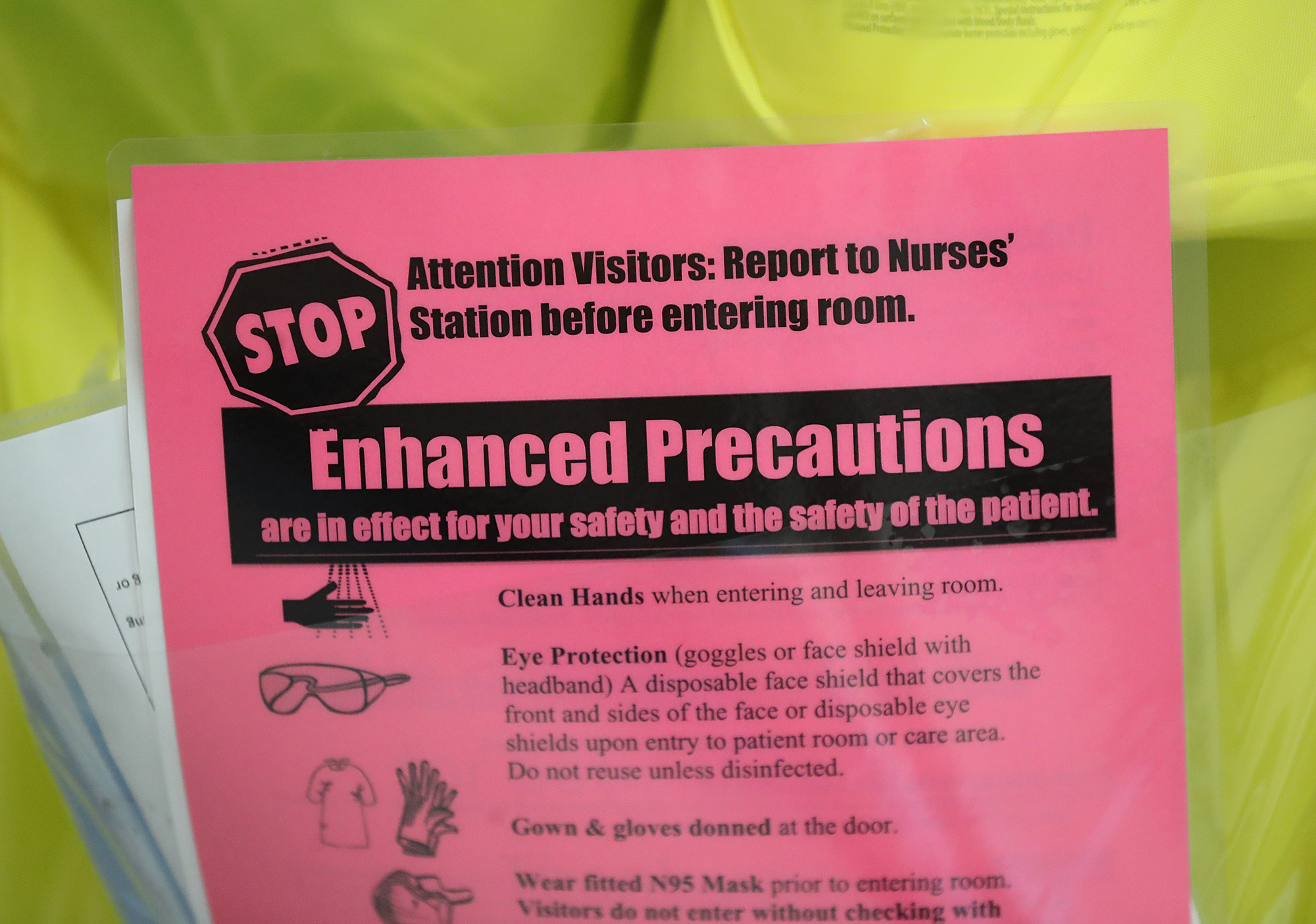 A sign warns visitors about enhanced precautions on the door to a monoclonal antibody infusion room at Phoebe Putney Memorial Hospital (North Campus) in Albany on Monday. Curtis Compton / Curtis.Compton@ajc.com”