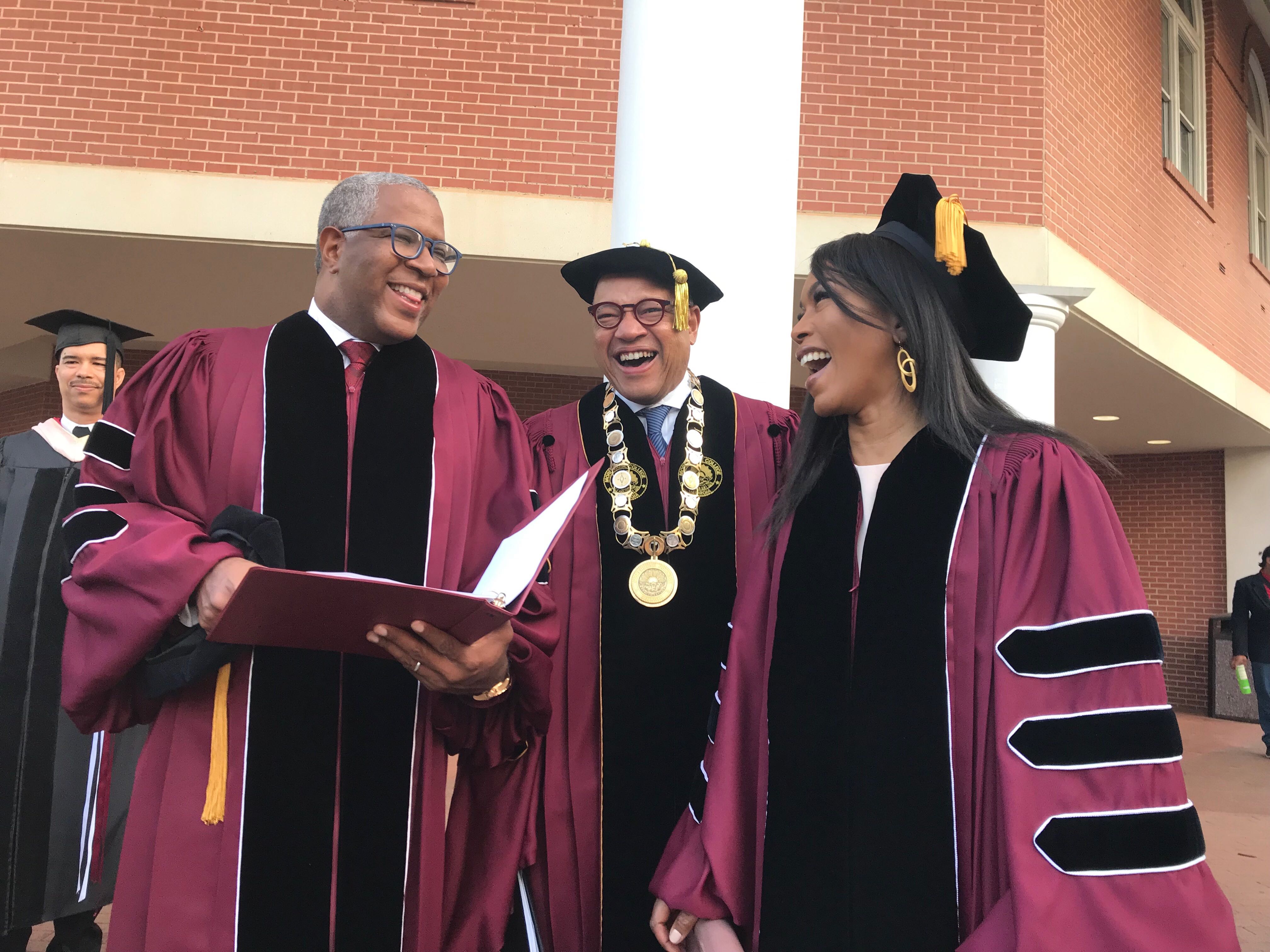 Tech billionaire Robert F. Smith (from left), Morehouse College President David Thomas and actress Angela Bassett prepare to walk to the graduation ceremonies at the college on Sunday, May 19, 2019. Smith and Bassett were to receive honorary degrees. (Photo: Bo Emerson/AJC)
